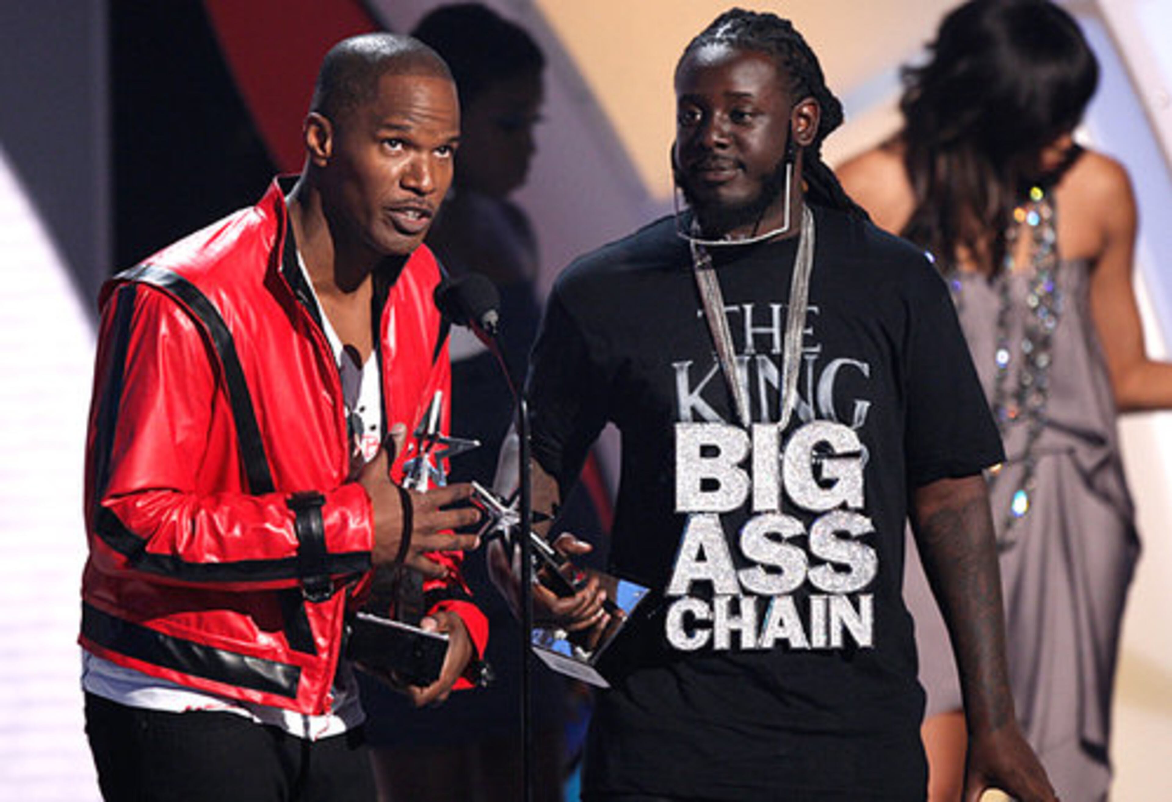 Jamie Foxx (L) and T-Pain accept the Best Collaboration award onstage.