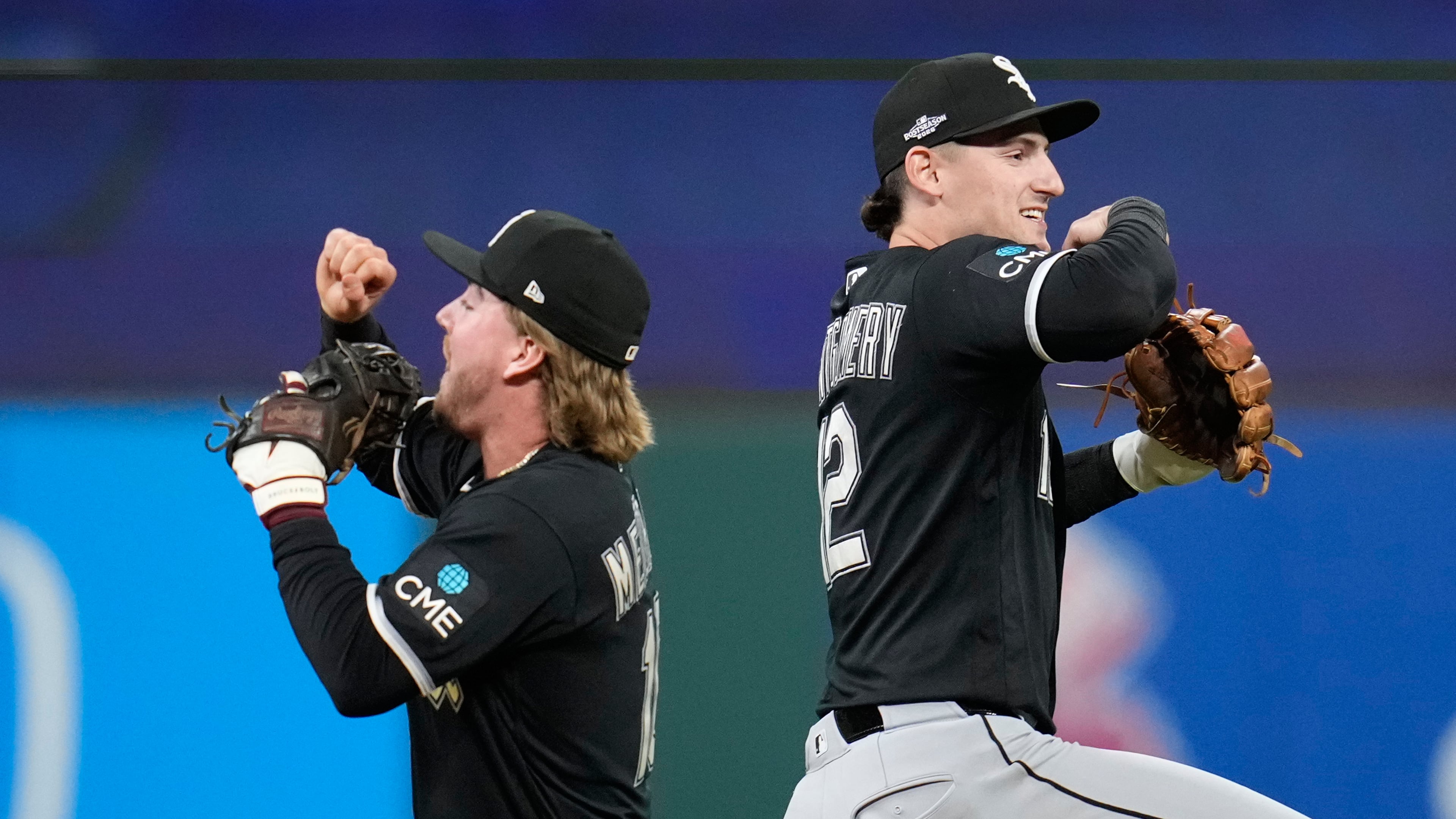 Chicago White Sox's Chase Meidroth, left, and Colson Montgomery, right, celebrate after Game 2 of baseball's American League Division Series against the Cleveland Guardians, Monday, Oct. 5, 2026, in Cleveland. (AP Photo/Sue Ogrocki)