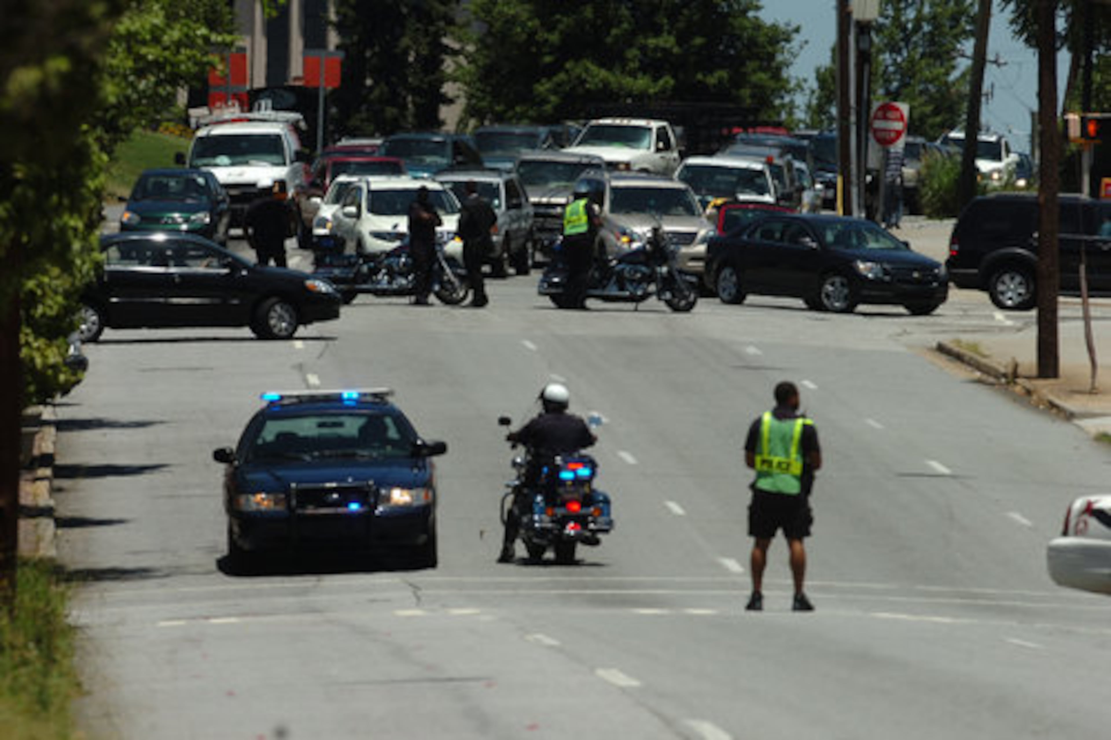 APD Officers blocking traffic on Spring Street.