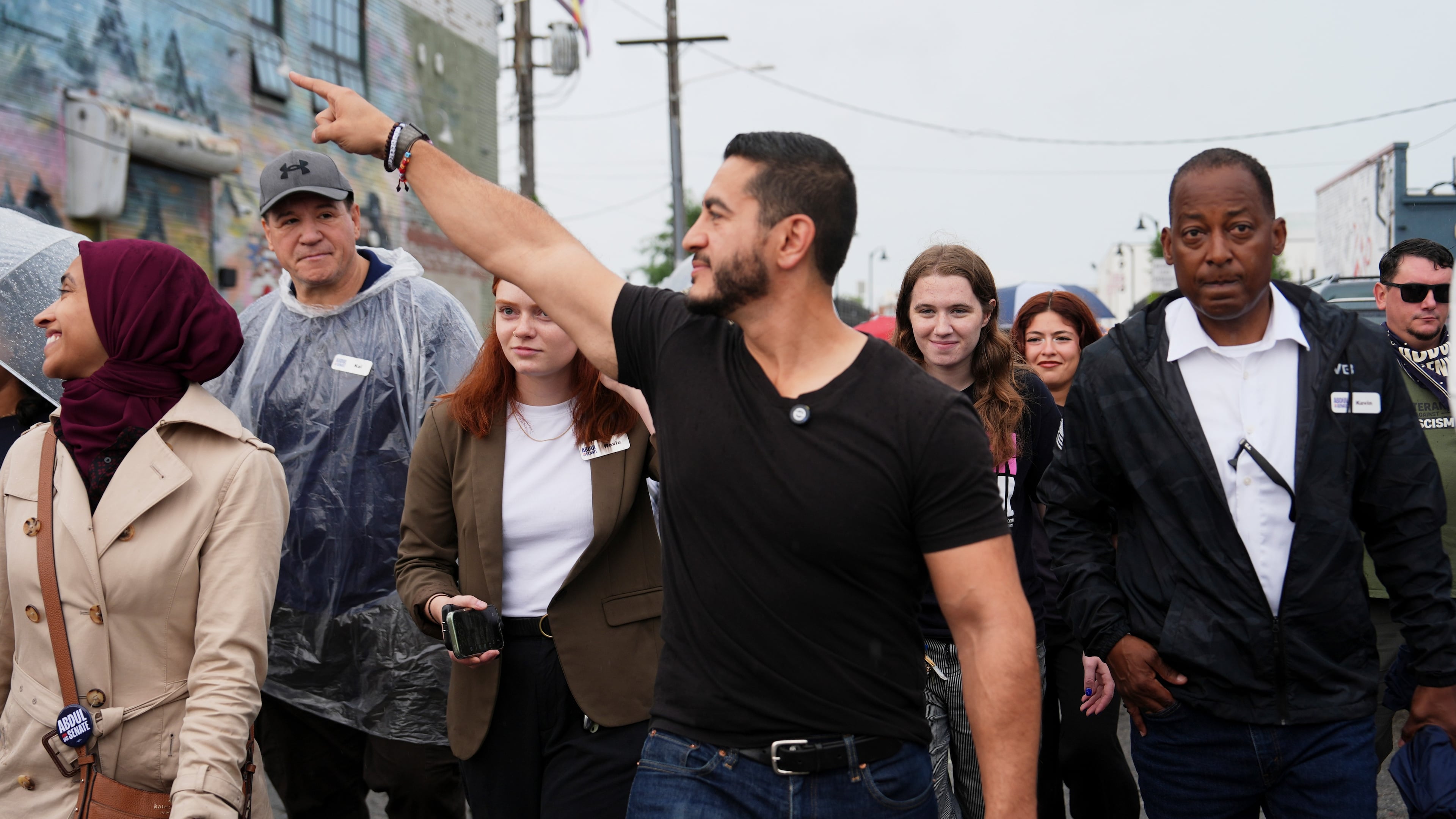 Abdul El-Sayed, a progressive candidate in the Democratic primary for U.S. Senate in Michigan, walks from Anthology Coffee to the Spirit of Detroit during the March of the Many, Sunday, Aug. 2, 2026, in Detroit. (AP Photo/Julia Demaree Nikhinson)