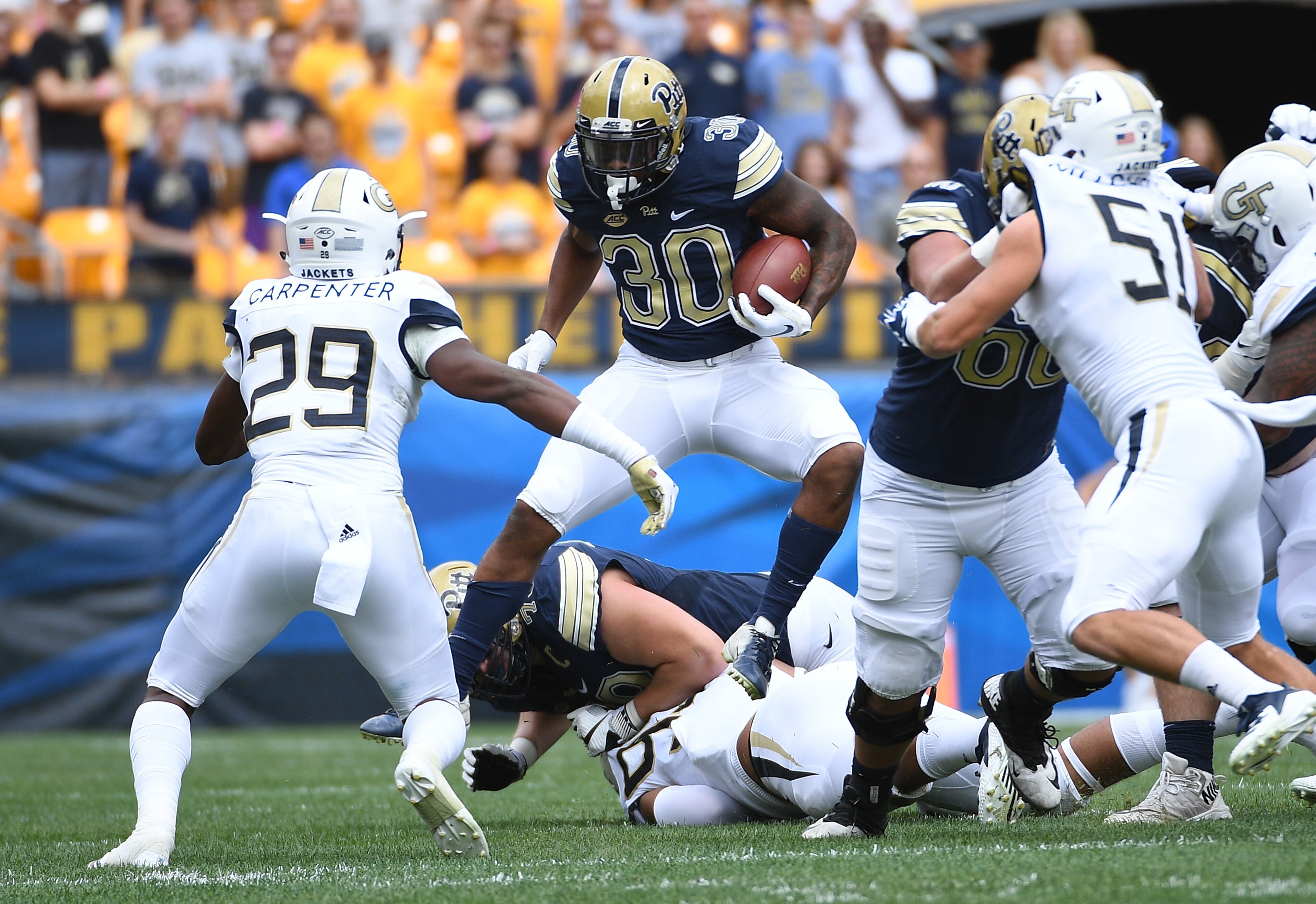 PITTSBURGH, PA - SEPTEMBER 15: Qadree Ollison #30 of the Pittsburgh Panthers runs the ball in the first half during the game against the Georgia Tech Yellow Jackets at Heinz Field on September 15, 2018 in Pittsburgh, Pennsylvania. (Photo by Justin Berl/Getty Images)