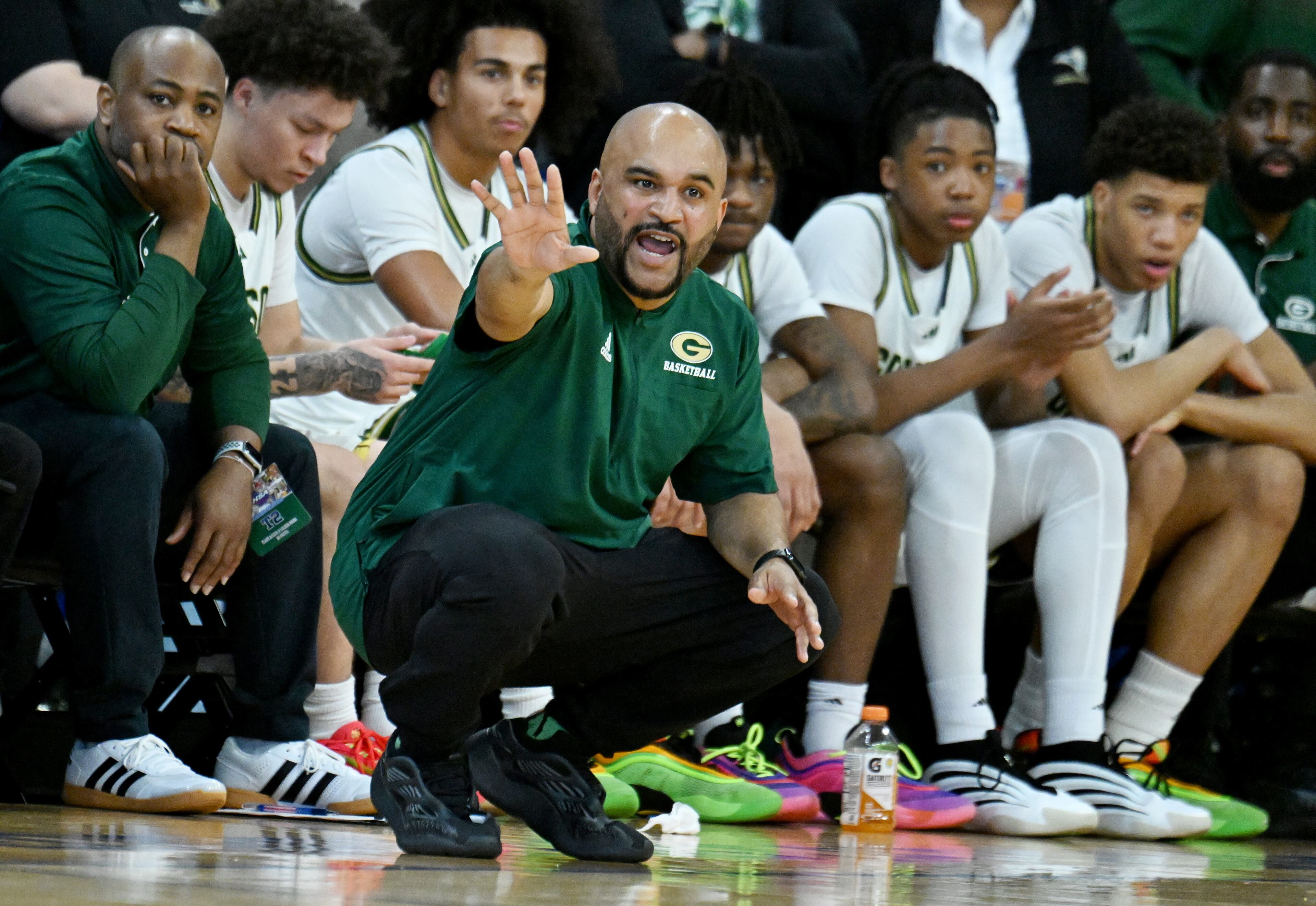 Grayson's head coach Geoffrey Pierce shouts instructions during the second half of the GHSA Class 6A Boys State Basketball playoffs game at the Georgia State Convocation Center, Saturday, March 1, 2025, in Atlanta. Wheeler won 68-53 over Grayson. (Hyosub Shin / AJC)
