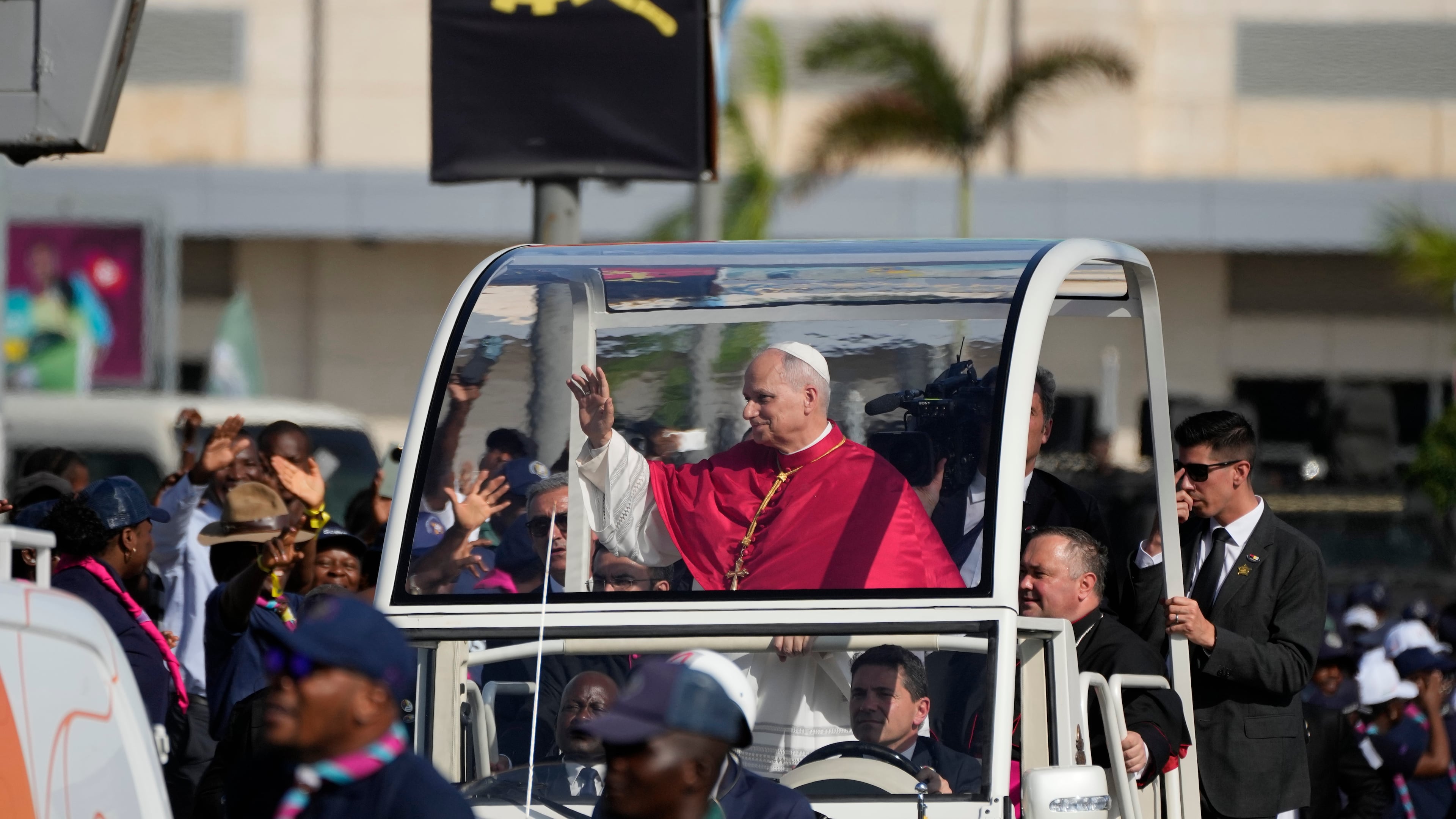 Pope Leo XIV waves after arriving in Luanda, Angola, Saturday, April 18, 2026 on the sixth day of his 11-day pastoral visit to Africa. (AP Photo/Themba Hadebe)