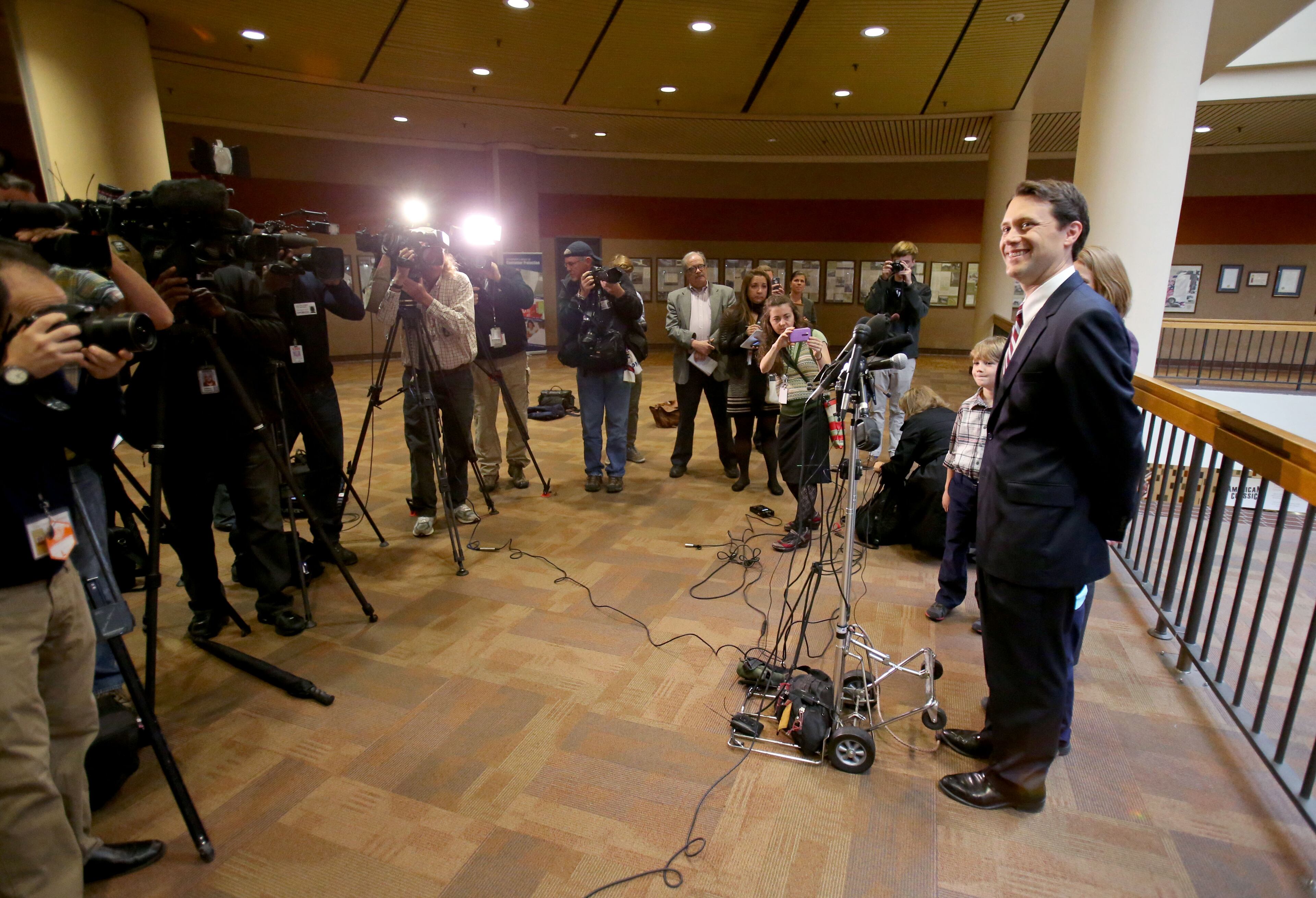 Sen. Jason Carter, D-Decatur, talks to members of the media after filing his formal candidacy papers to run for governor at the State Ethics Commission in Atlanta on Nov. 7, 2013. Carter announced today that he will run for governor in Georgia in the 2014 governor's race.