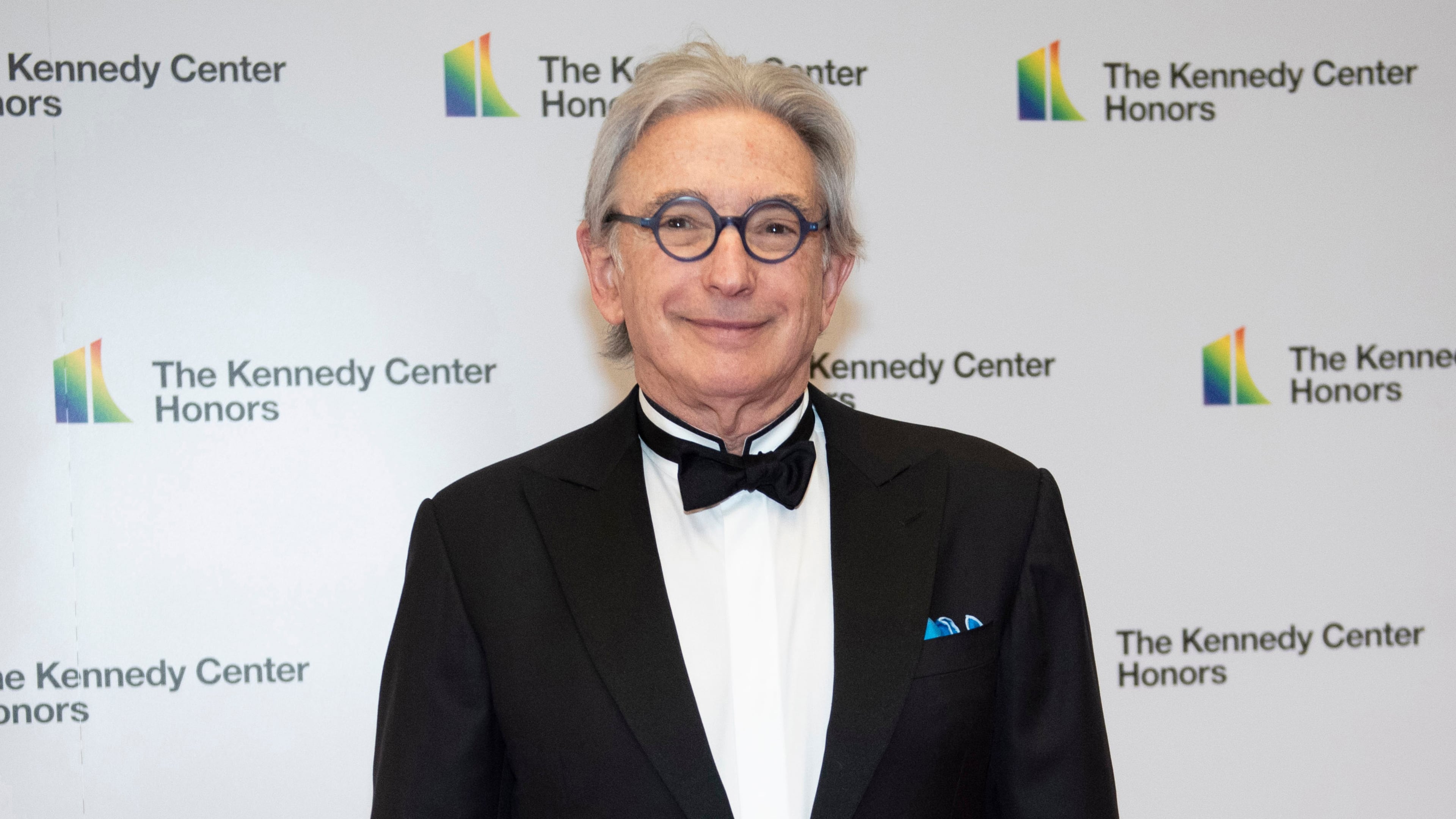 FILE - 2019 Kennedy Center Honoree conductor Michael Tilson Thomas arrives at the State Department for the Kennedy Center Honors in Washington on Dec. 7, 2019. (AP Photo/Kevin Wolf, File)