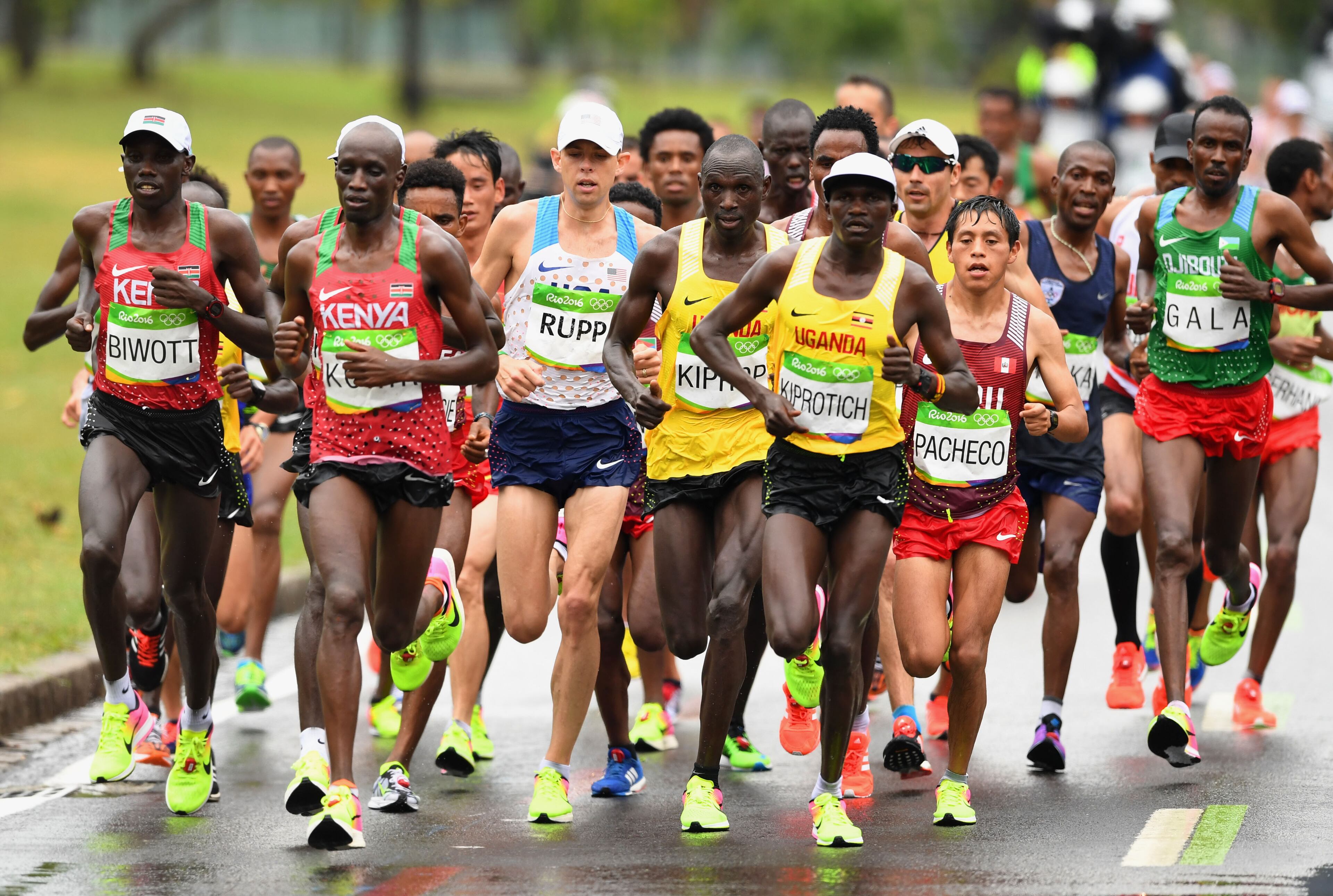RIO DE JANEIRO, BRAZIL - AUGUST 21: Wesley Korir of Kenya, Galen Rupp of the United States, Jackson Kiprop of Uganda and Stephen Kiprotich of Uganda compete during the Men's Marathon on Day 16 of the Rio 2016 Olympic Games at Sambodromo on August 21, 2016 in Rio de Janeiro, Brazil. (Photo by Quinn Rooney/Getty Images)