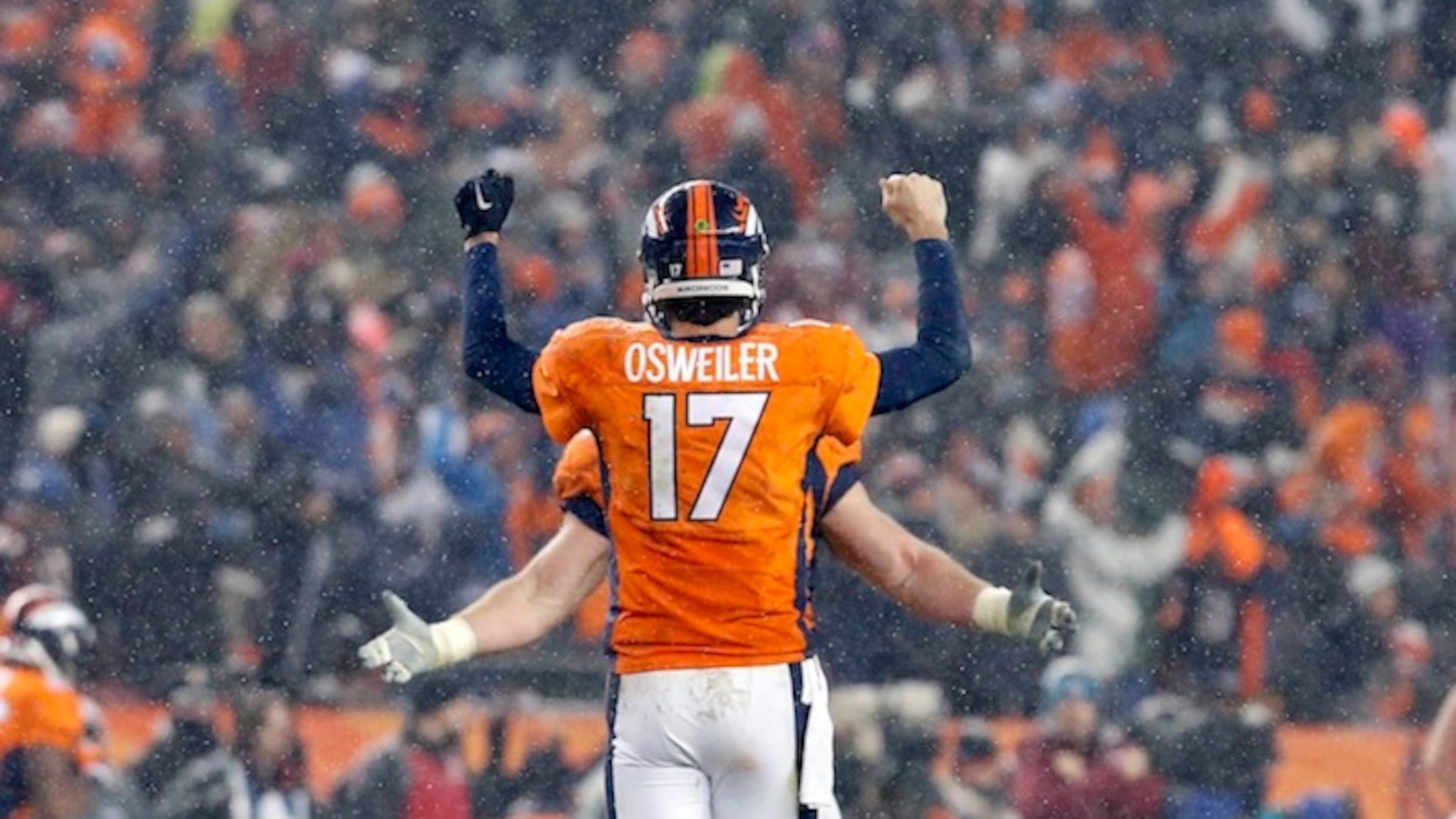 Denver Broncos quarterback Brock Osweiler (17) celebrates the game winning touchdown during overtime of an NFL football game against the New England Patriots, Sunday, Nov. 29, 2015, in Denver. The Broncos defeated the Patriots 30-24. (AP Photo/Joe Mahoney)