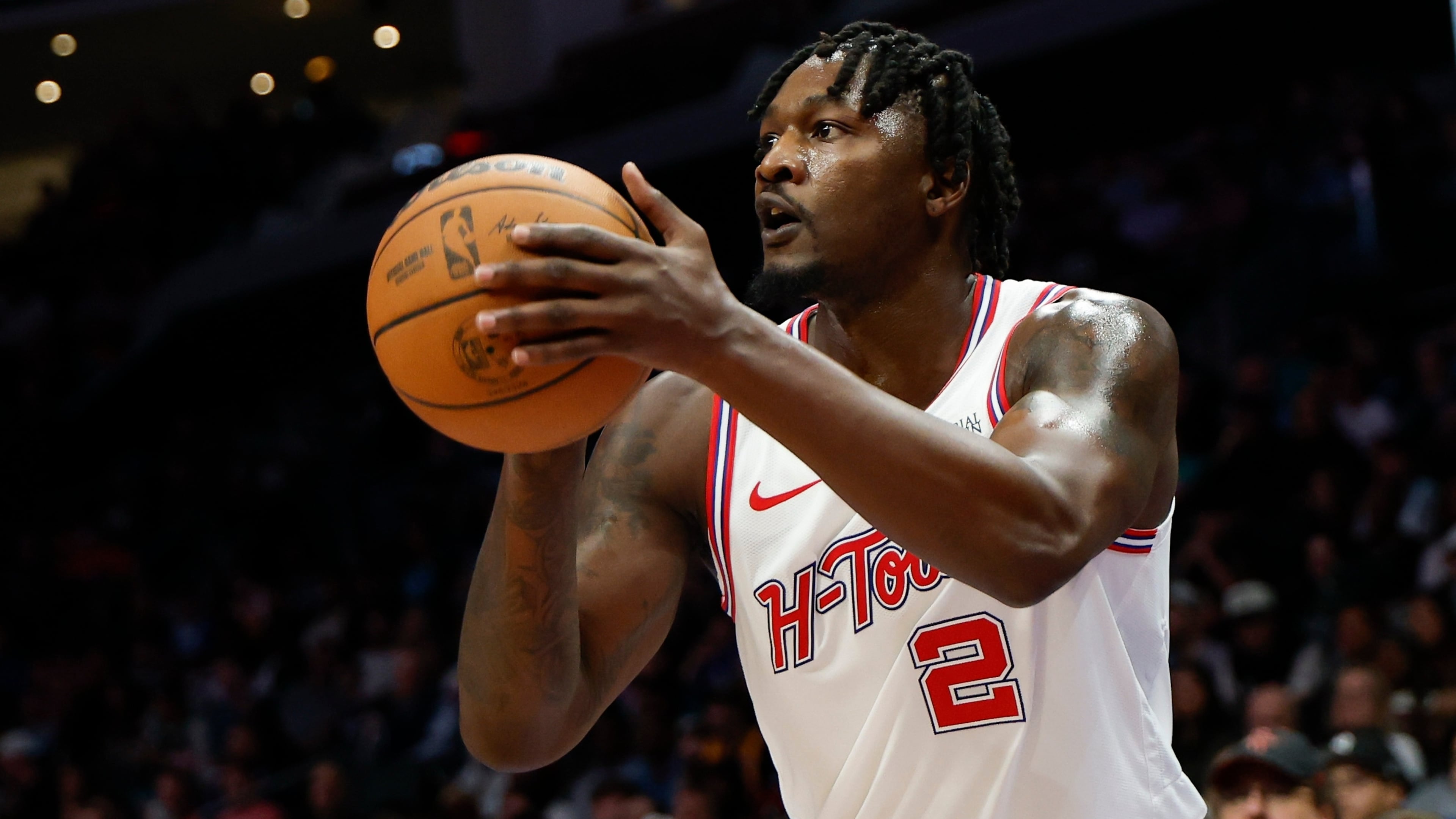FILE - Houston Rockets forward Dorian Finney-Smith shoots against the Charlotte Hornets during the first half of an NBA basketball game in Charlotte, N.C., Feb. 19, 2026. (AP Photo/Nell Redmond, File)