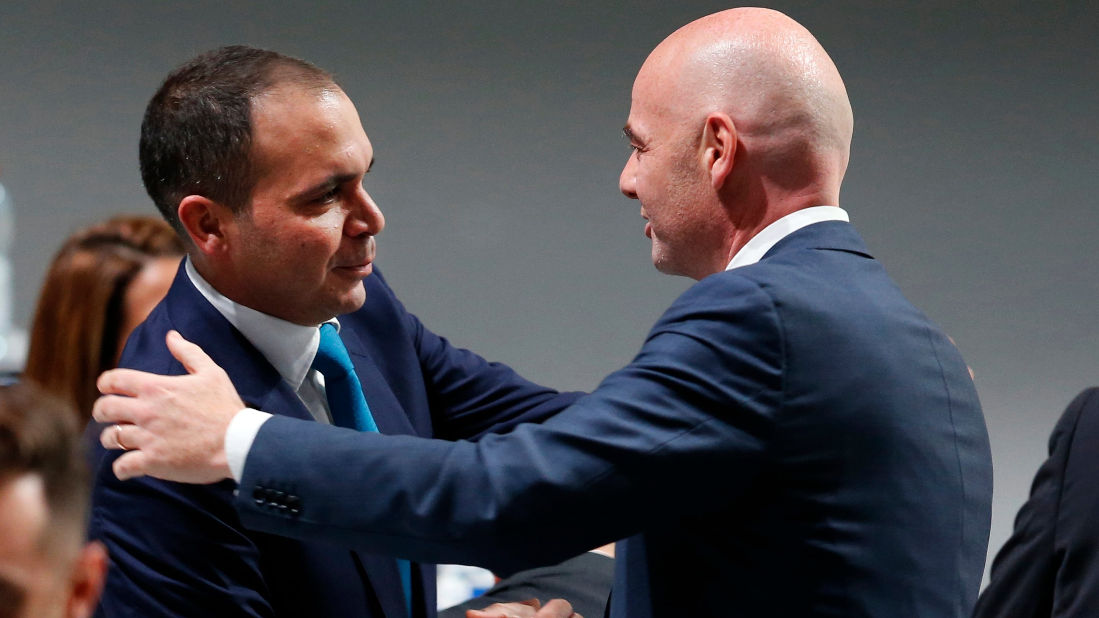 FILE - Newly elected FIFA President Gianni Infantino, of Switzerland, right, is congratulated by fellow candidate Prince Ali Al-Hussein, of Jordan, left, after the second election round during the extraordinary FIFA congress in Zurich, Switzerland, Feb. 26, 2016. (AP Photo/Michael Probst, File)