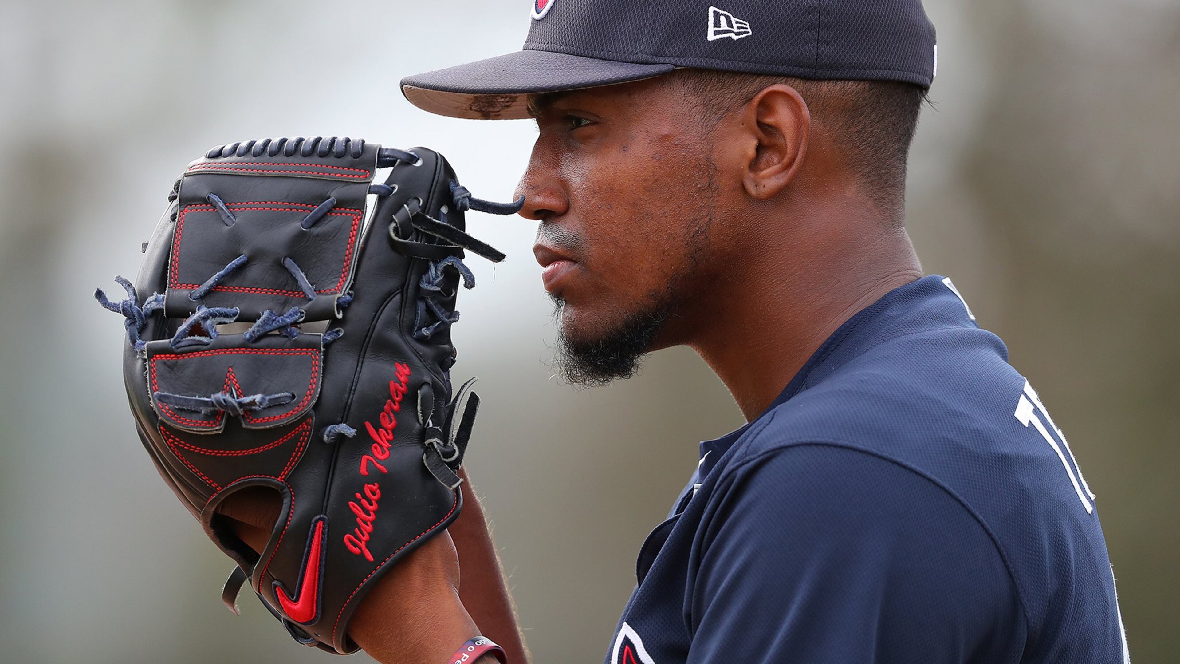 Braves Julio Teheran prepares to throw a pitch while pitchers and catchers hold their first spring training workout on Feb. 15. Curtis Compton/ccompton@ajc.com