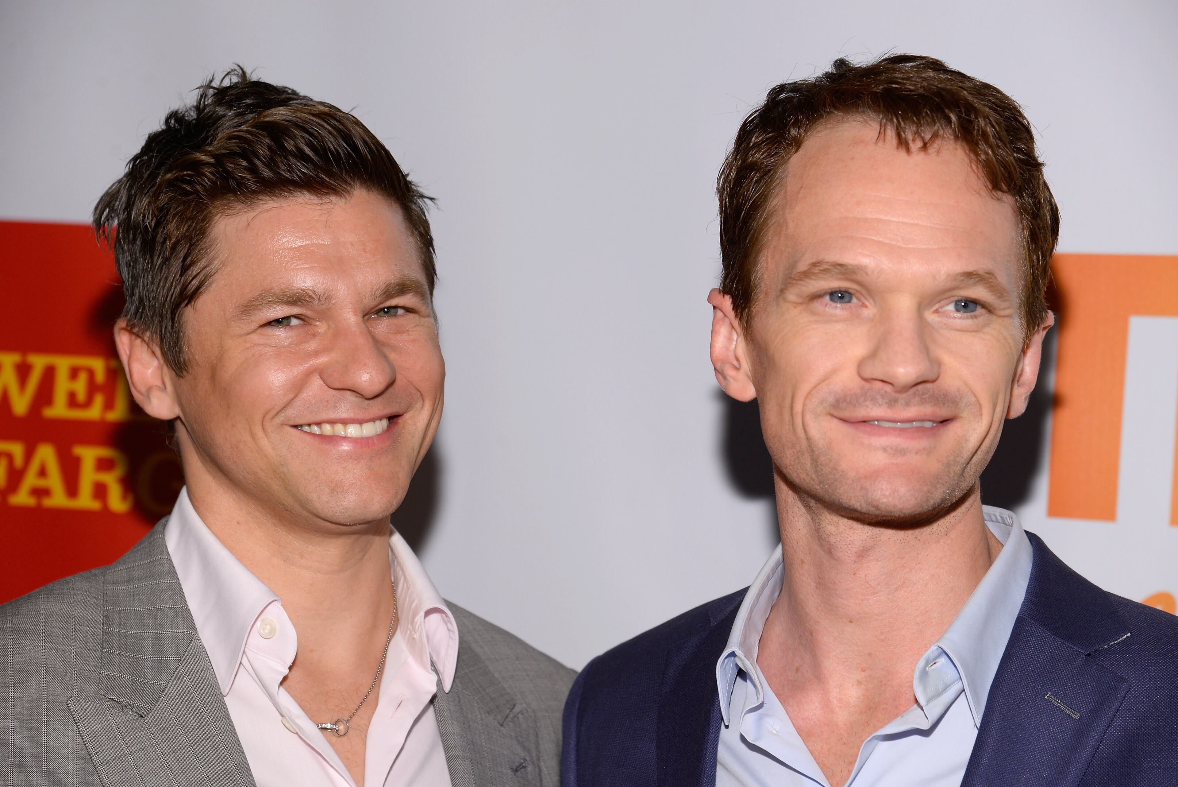 David Burtka (L) and Neil Patrick Harris, seen here at the "TrevorLIVE NY" Event at the Marriott Marquis Hotel on June 16, 2014, in New York City, adopted twins Harper Grace and Gideon Scott in 2010. The children were born via surrogate, People Magazine reported at the time. (Photo by Dave Kotinsky/Getty Images)