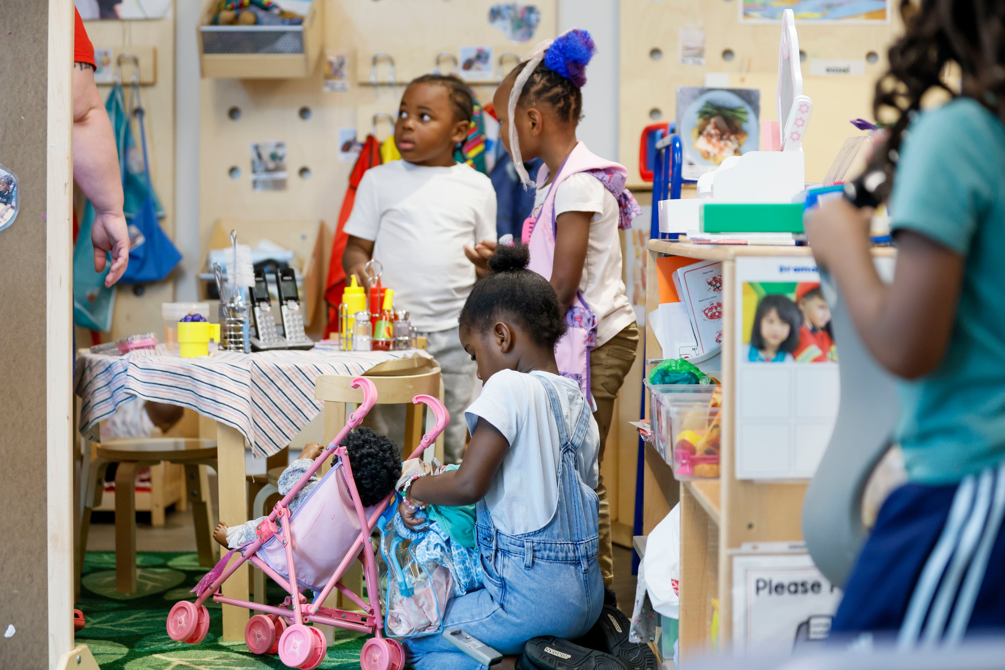 A child in the Head Start program engages in indoor activities at the Arthur M. Blank Early Learning Center, Monday. (Miguel Martinez/AJC)