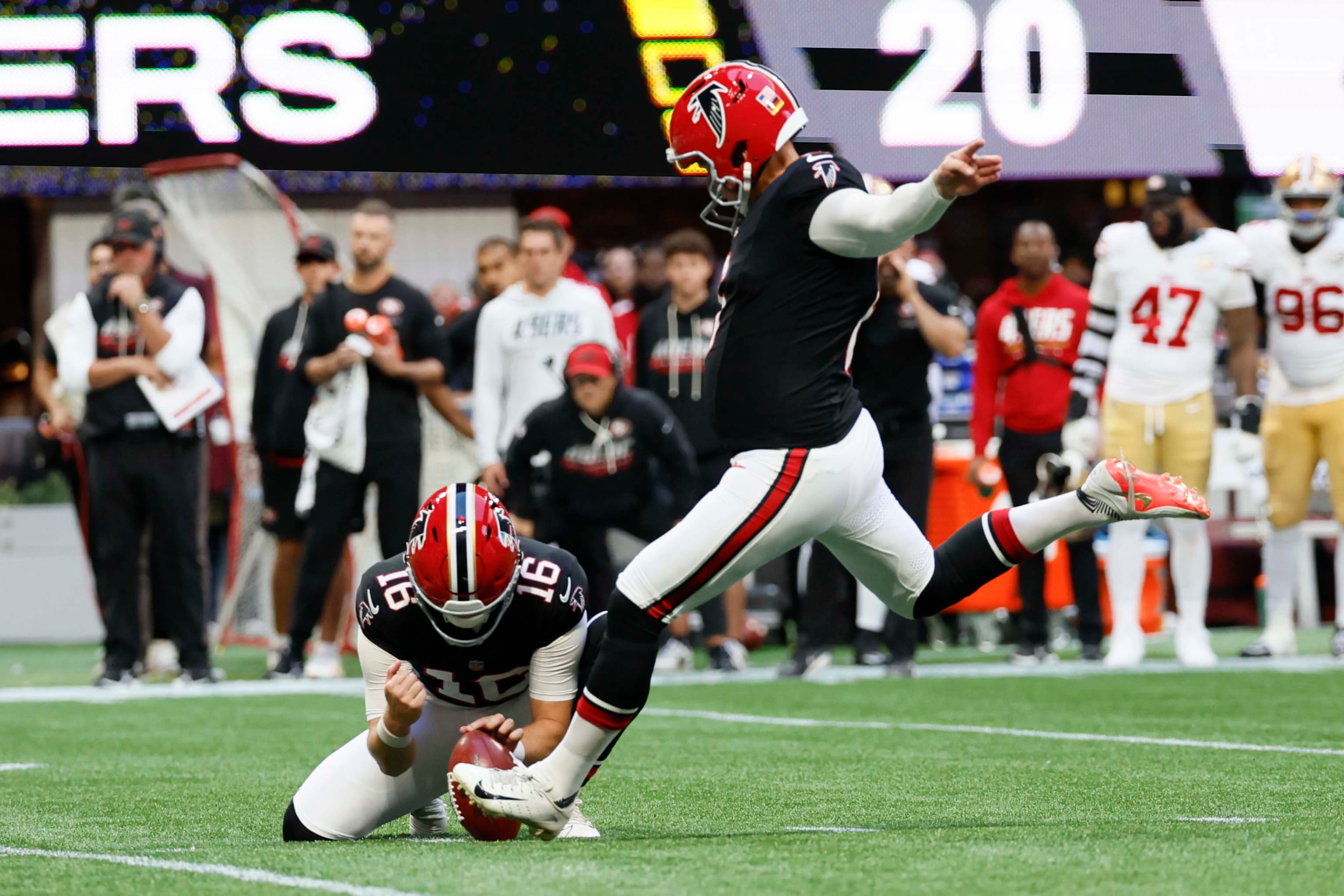 Atlanta Falcons punter Jake Bailey (16) attempts a field goal to score in the final minutes of the game during the second half of a football game against the San Francisco 49ers at Mercedes-Benz Stadium in Atlanta, GA, on Sunday, Oct. 25, 2026. (Miguel Martinez/AJC)