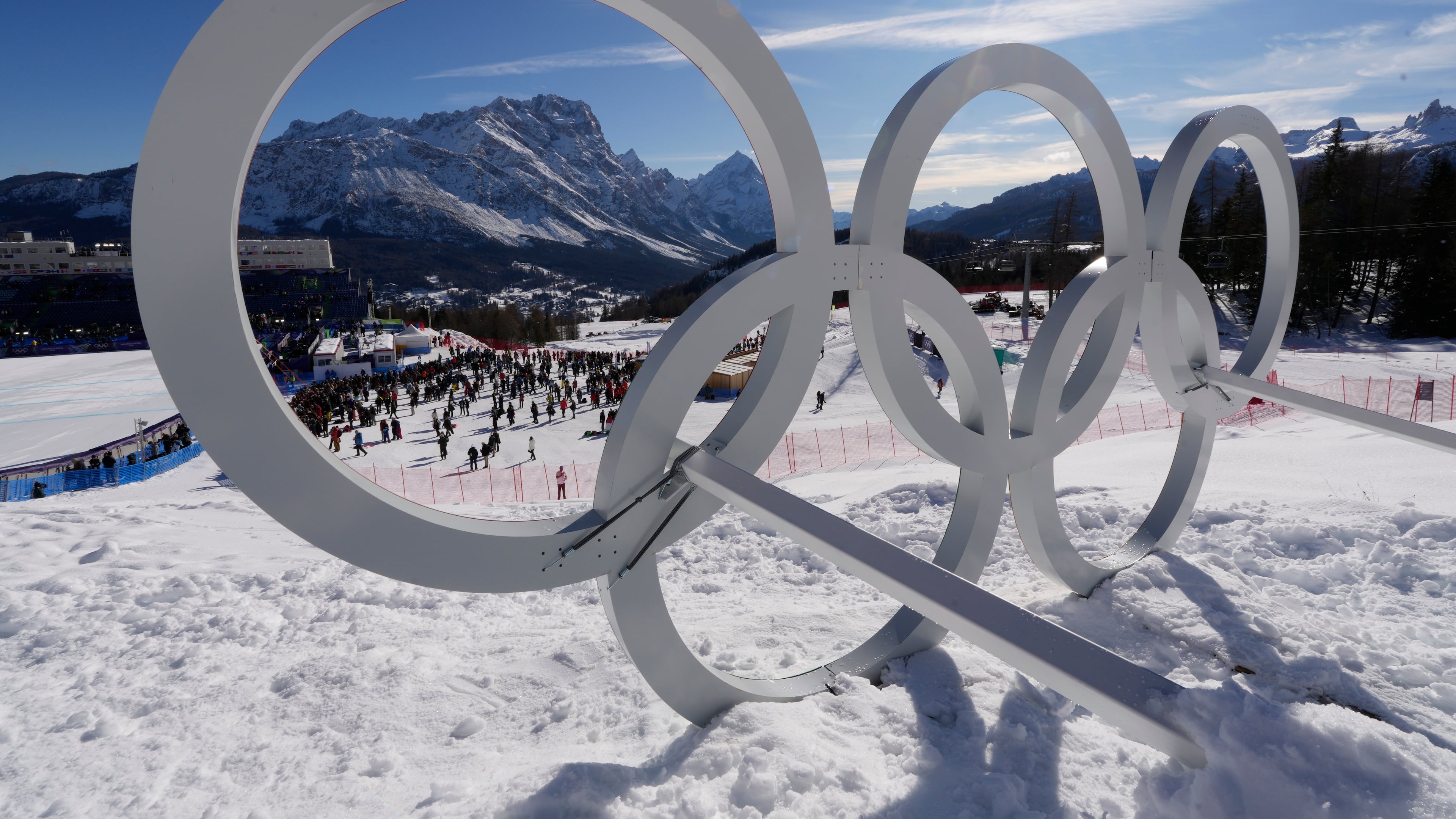 FILE - Olympic rings are seen at the 2026 Winter Olympics in Cortina d'Ampezzo, Italy, Feb. 8, 2026. (AP Photo/Robert F. Bukaty, File)