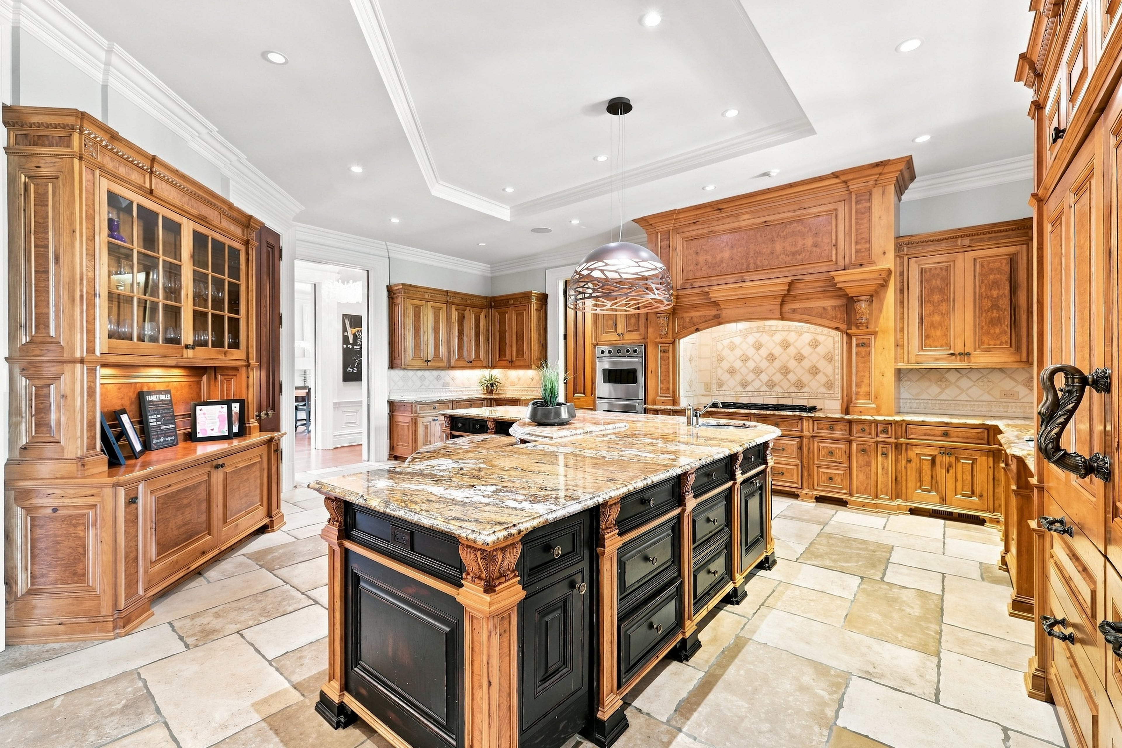 The home features six kitchens including this one. (Courtesy of HomeSmart)