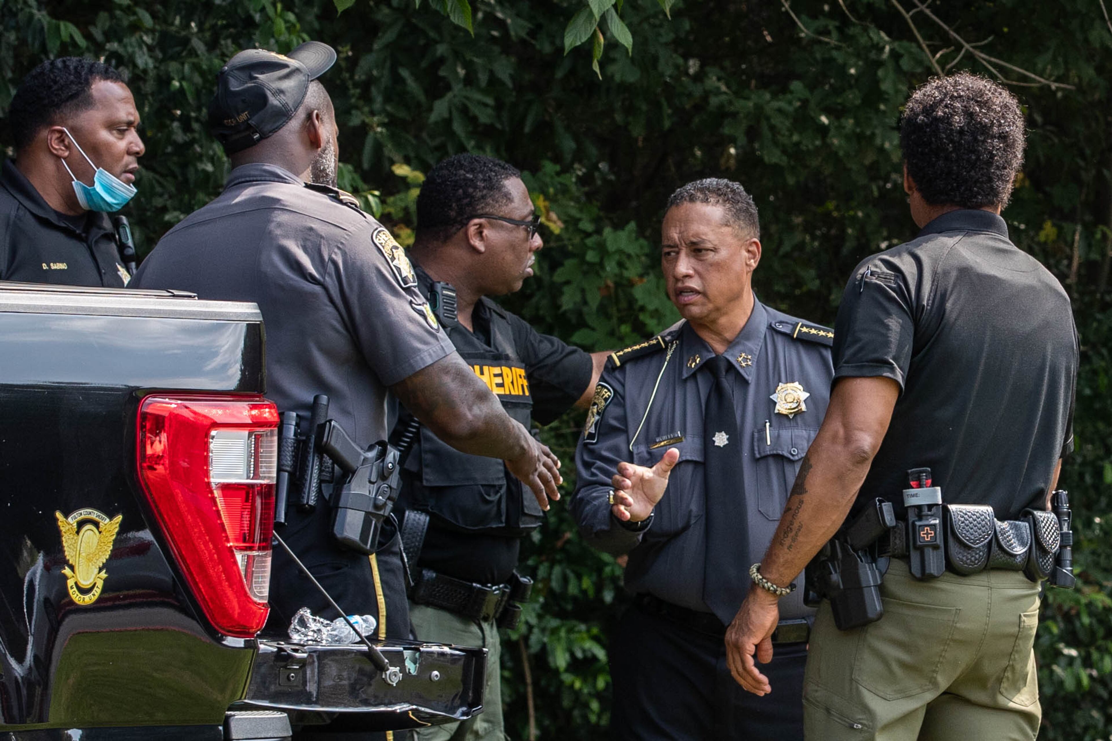 Sheriff Labat talks to officials at the Fulton County Jail waiting for Trump’s arrival in Atlanta on Thursday, August 24, 2023. (Katelyn Myrick/katelyn.myrick@ajc.com)
