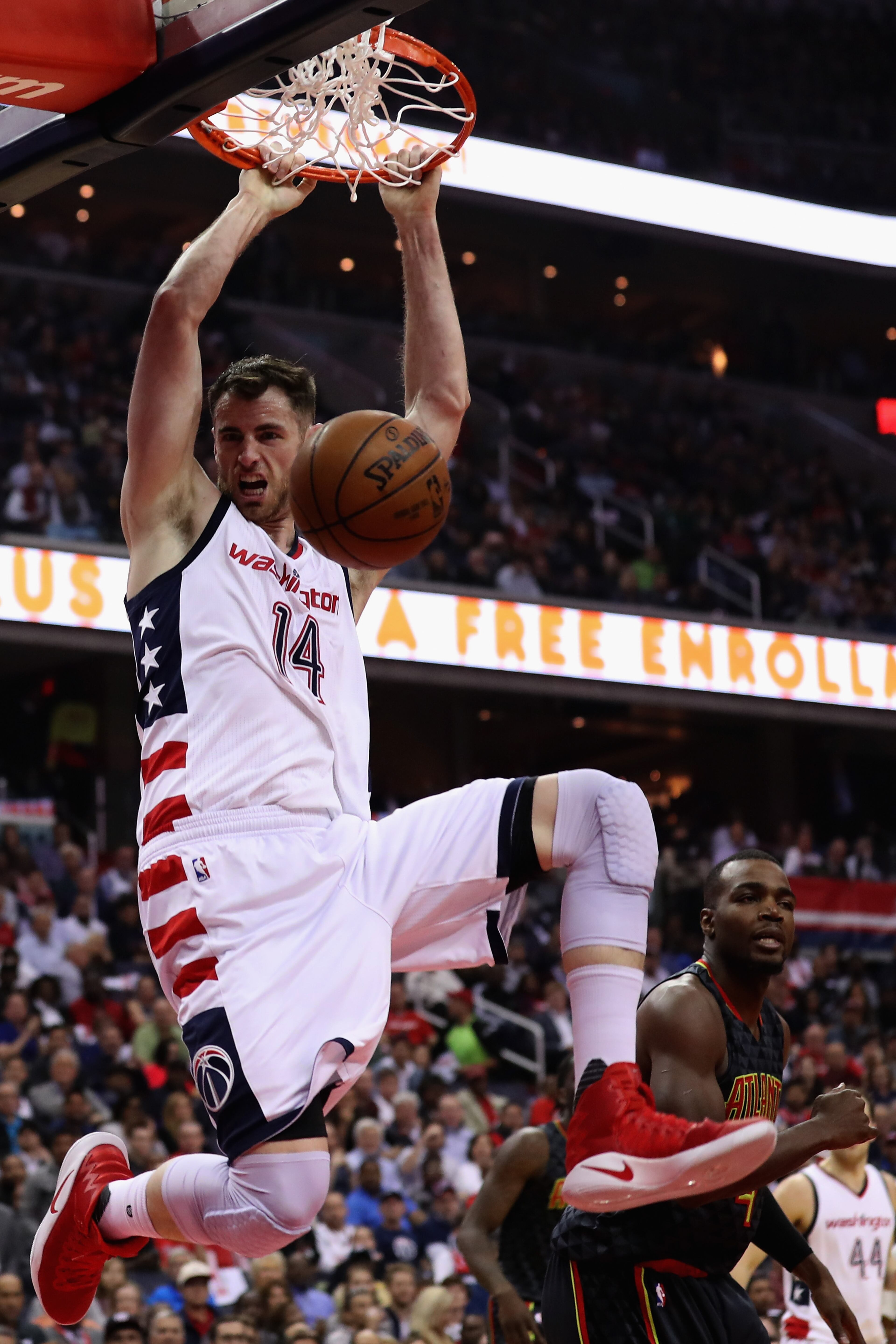 WASHINGTON, DC - APRIL 19: Jason Smith #14 of the Washington Wizards dunks the ball against the Atlanta Hawks in the first half of Game Two of the Eastern Conference Quarterfinals during the 2017 NBA Playoffs at Verizon Center on April 19, 2017 in Washington, DC. NOTE TO USER: User expressly acknowledges and agrees that, by downloading and or using this photograph, User is consenting to the terms and conditions of the Getty Images License Agreement. (Photo by Rob Carr/Getty Images)