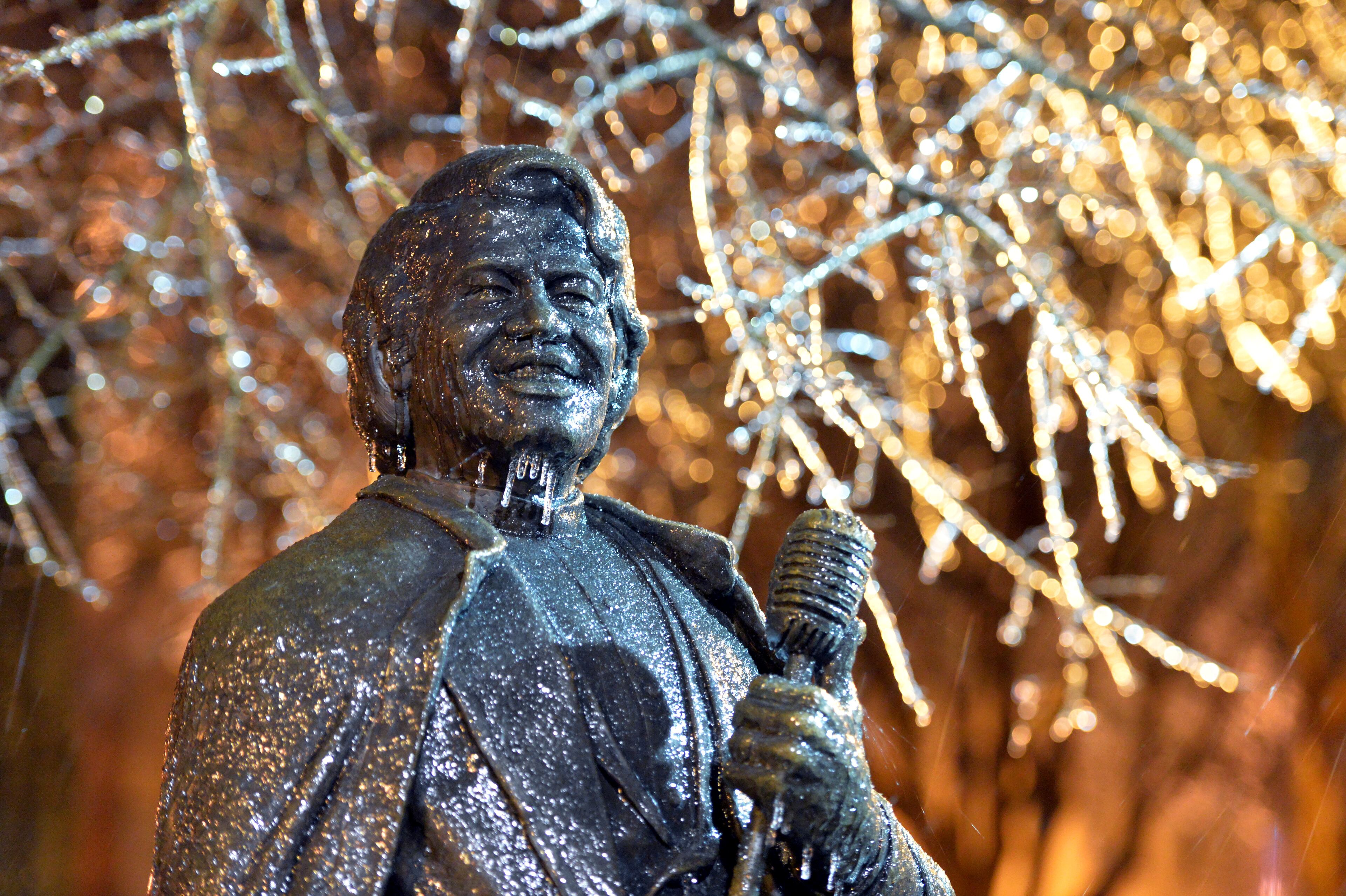 Ice is formed on the life-size bronze statue of James Brown in downtown Augusta on Wednesday, February 12, 2014. Georgia's so-called Garden City prepared to be Ice City by morning, with thousands of homes losing power and felled trees shutting down roadways. HYOSUB SHIN / HSHIN@AJC.COM