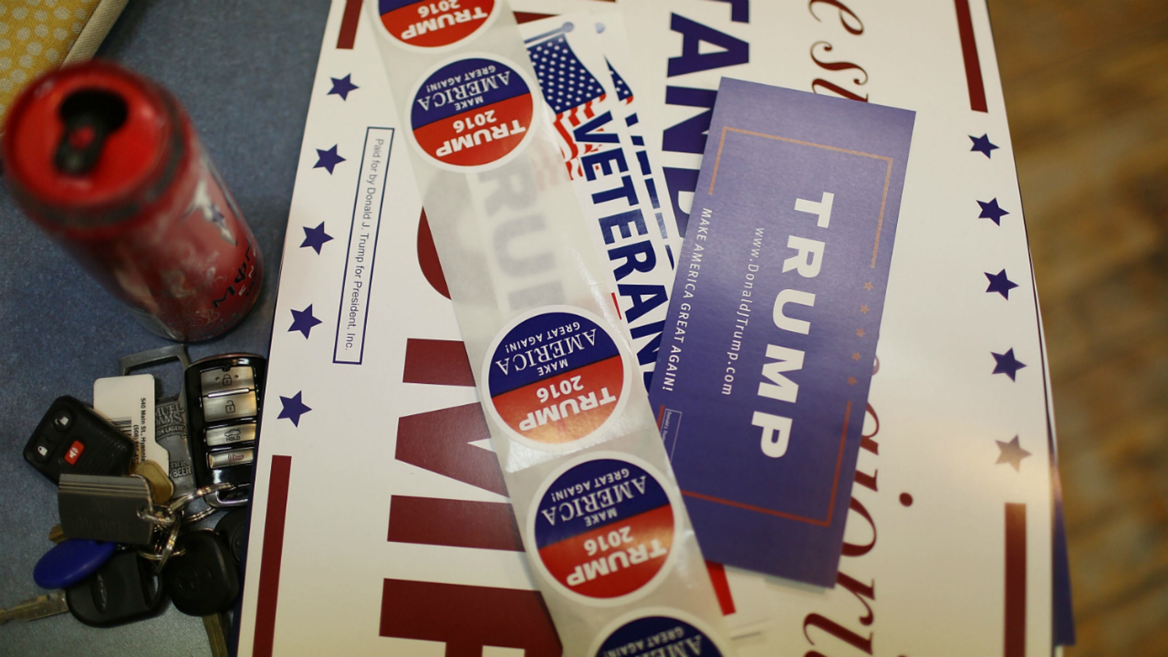 Campaign posters and stickers are seen as volunteers call voters asking them to vote for Republican presidential candidate Donald Trump while working at the Newmarket Trump campaign headquarters on February 8, 2016 in Newmarket, New Hampshire.