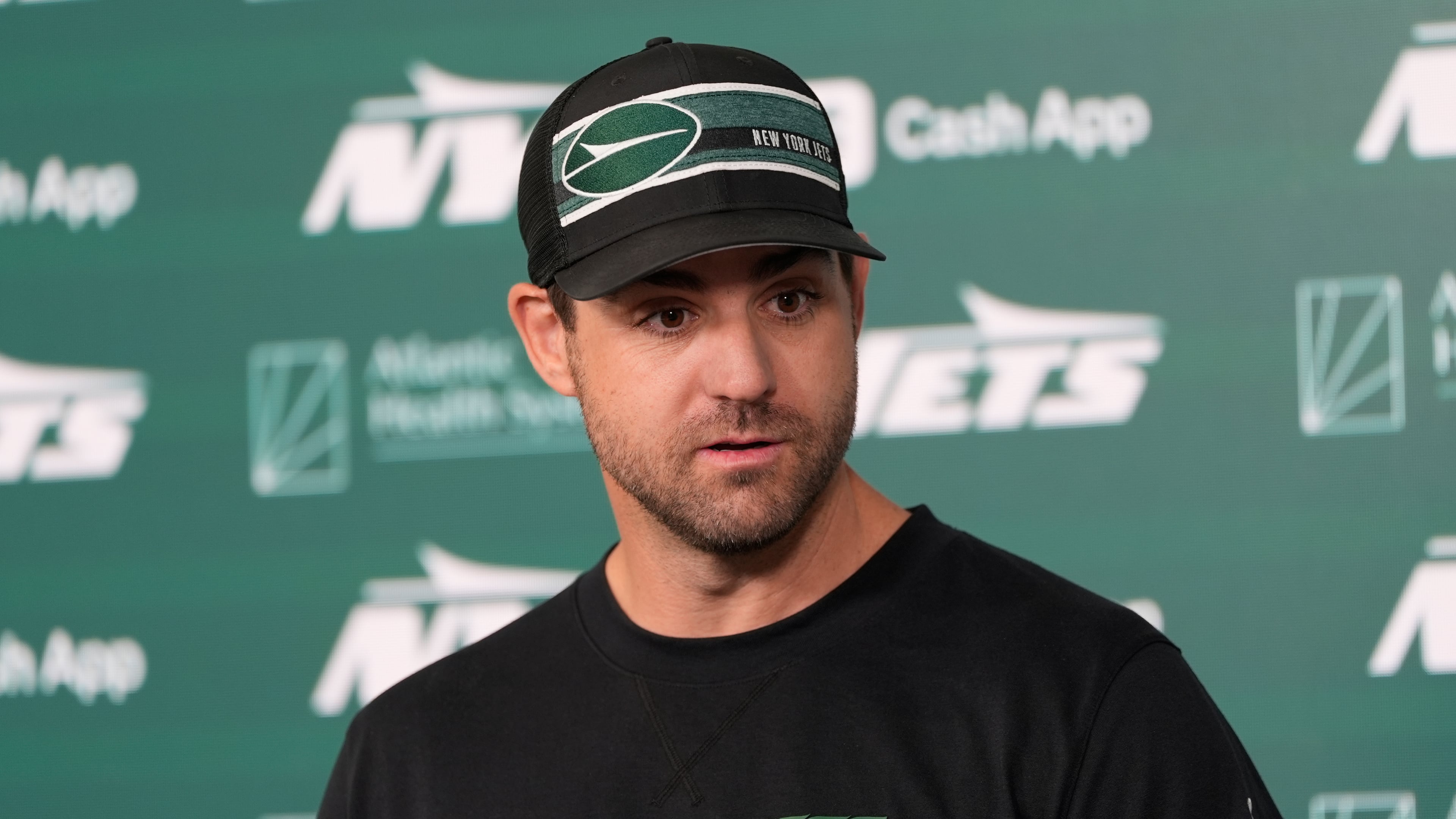 Tanner Engstrand, offensive coordinator for the New York Jets, talk to reporters before an NFL football practice in Florham Park, N.J., Thursday, May 29, 2025. (AP Photo/Seth Wenig)