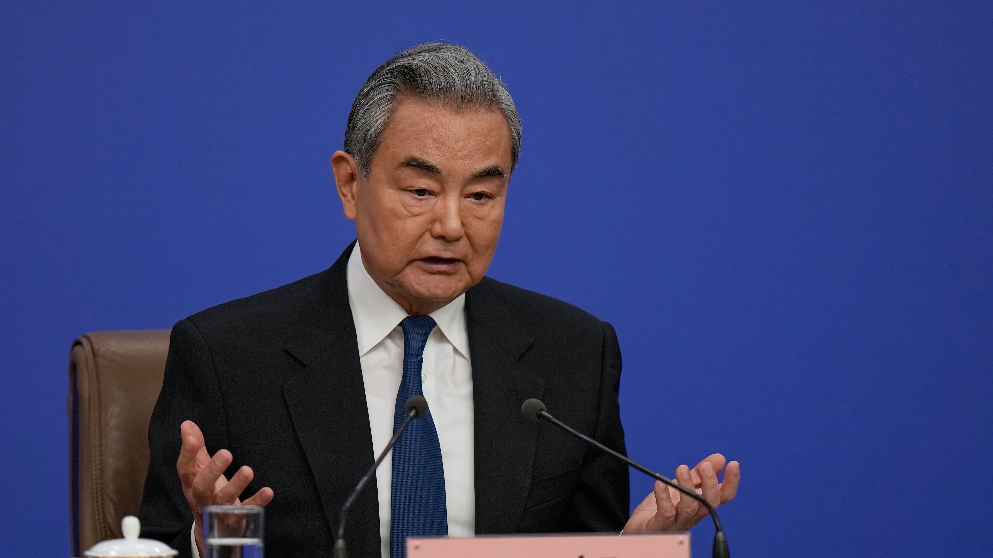 Chinese Foreign Minister Wang Yi speaks during a press conference on the sideline of the National People's Congress (NPC) at the media center, in Beijing, Sunday, March 8, 2026. (AP Photo/Andy Wong)