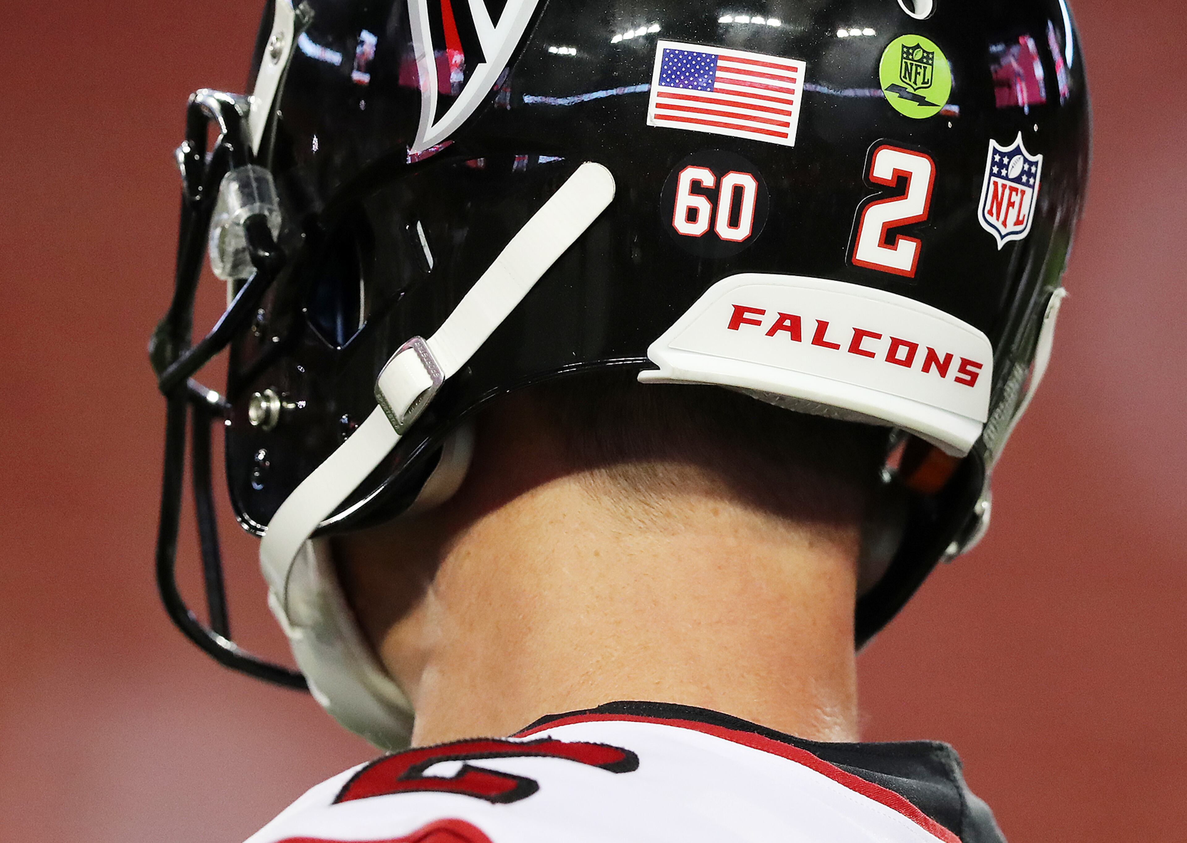 December 18, 2017 Tampa: Falcons quarterback Matt Ryan and the team wear a # 60 decal on their helmets to commemorate the life of Tommy Nobis during the game against the Buccaneers in a NFL football game on Monday, December 18, 2017, in Tampa. Curtis Compton/ccompton@ajc.com