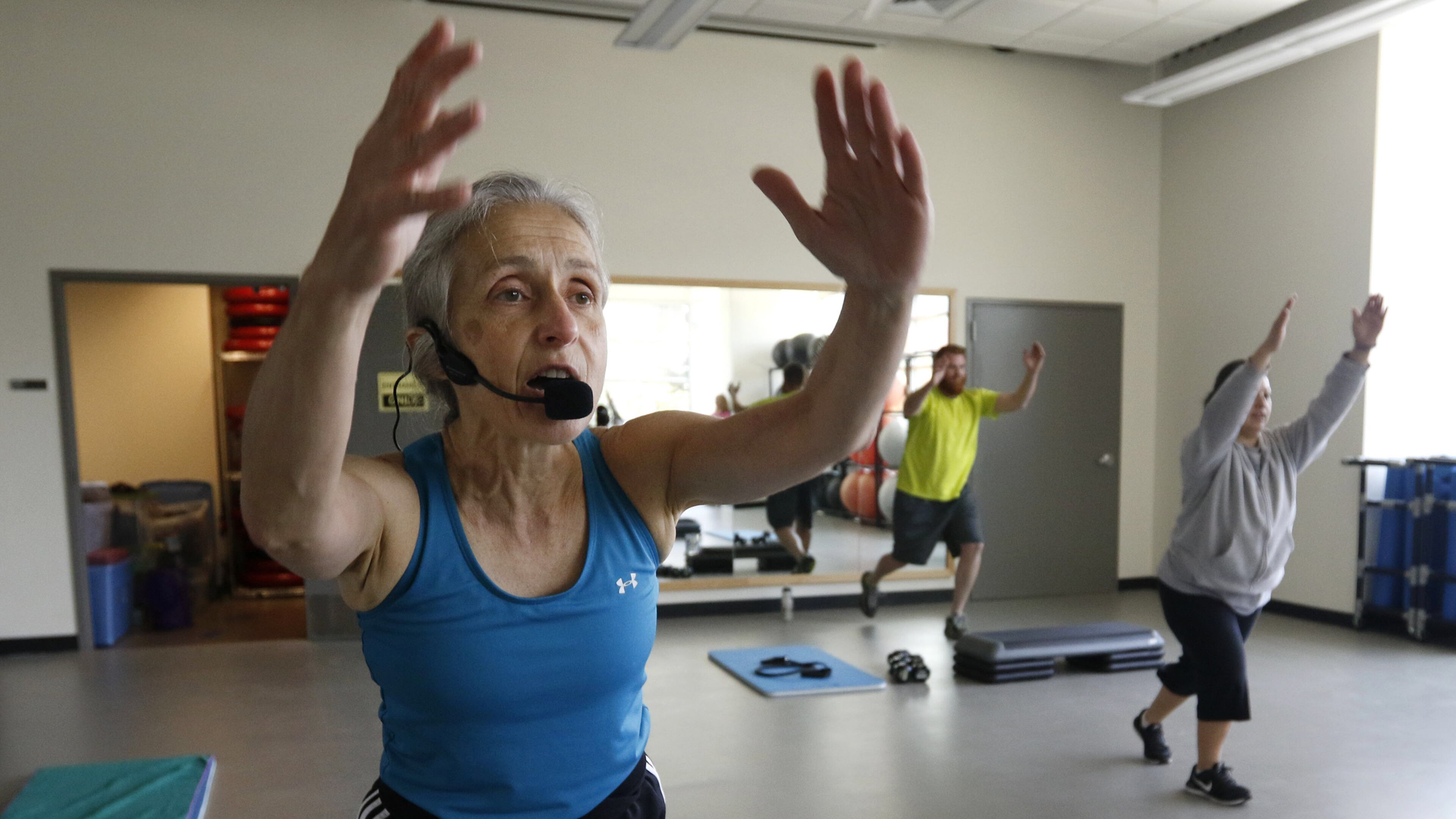 Grace Chalon, group exercise instructor, leads a “tight and toned” class at the fitness and recreation center at TWU in Denton, Texas, on May 11, 2016. (Rose Baca/Dallas Morning News/TNS)