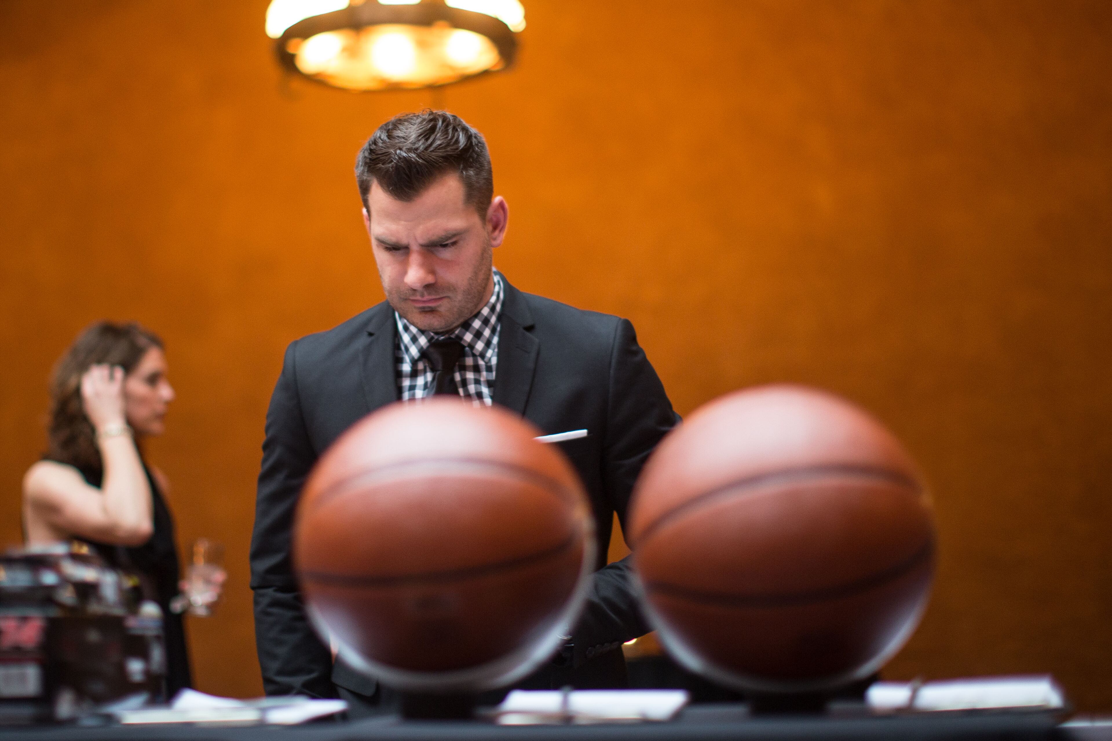 Ben Oberman looks at items at the silent auction during the 10th annual Atlanta Sports Awards held at the Fox Theatre, Thursday, March 5, 2015, in Atlanta. (SPECIAL/BRANDEN CAMP)