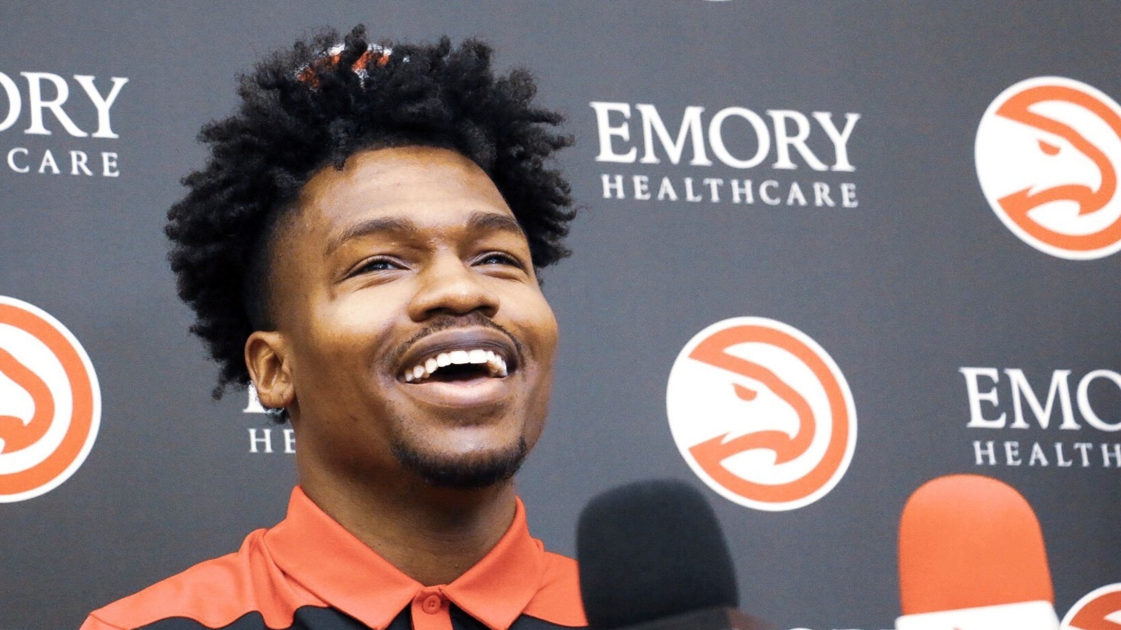 Brandon Goodwin talks with the hometown press after signing his two-way contract with the Hawks. (Andy Bowers/Hawks Digital