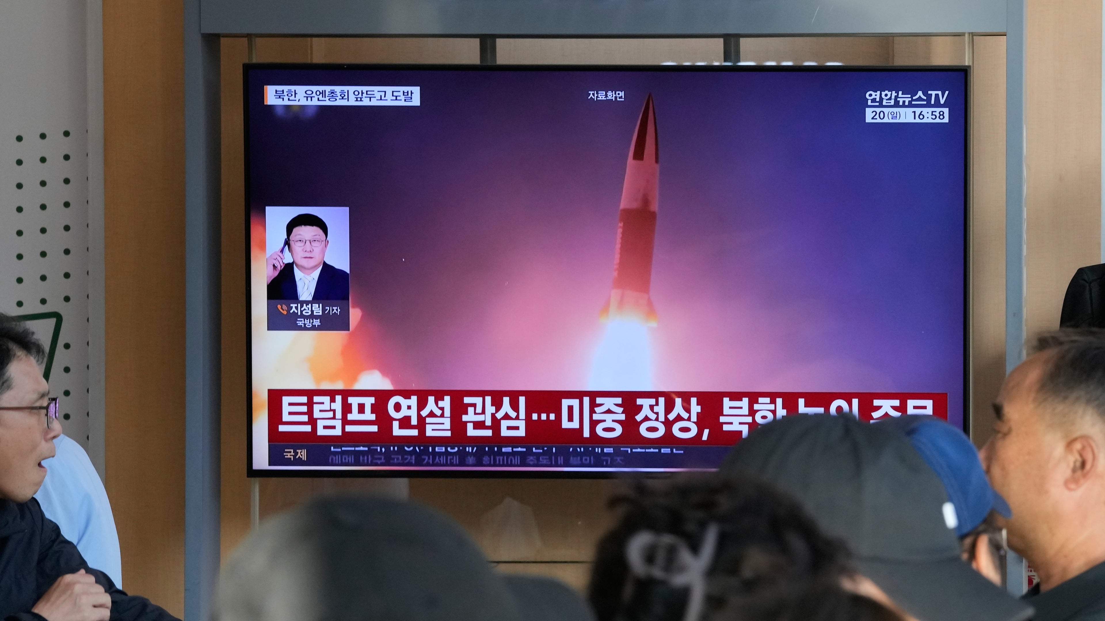 A TV screen shows a file image of a North Korean missile launch during a news program at Seoul Railway Station in Seoul, South Korea, Sunday, Sept. 20, 2026. (AP Photo/Ahn Young-joon)