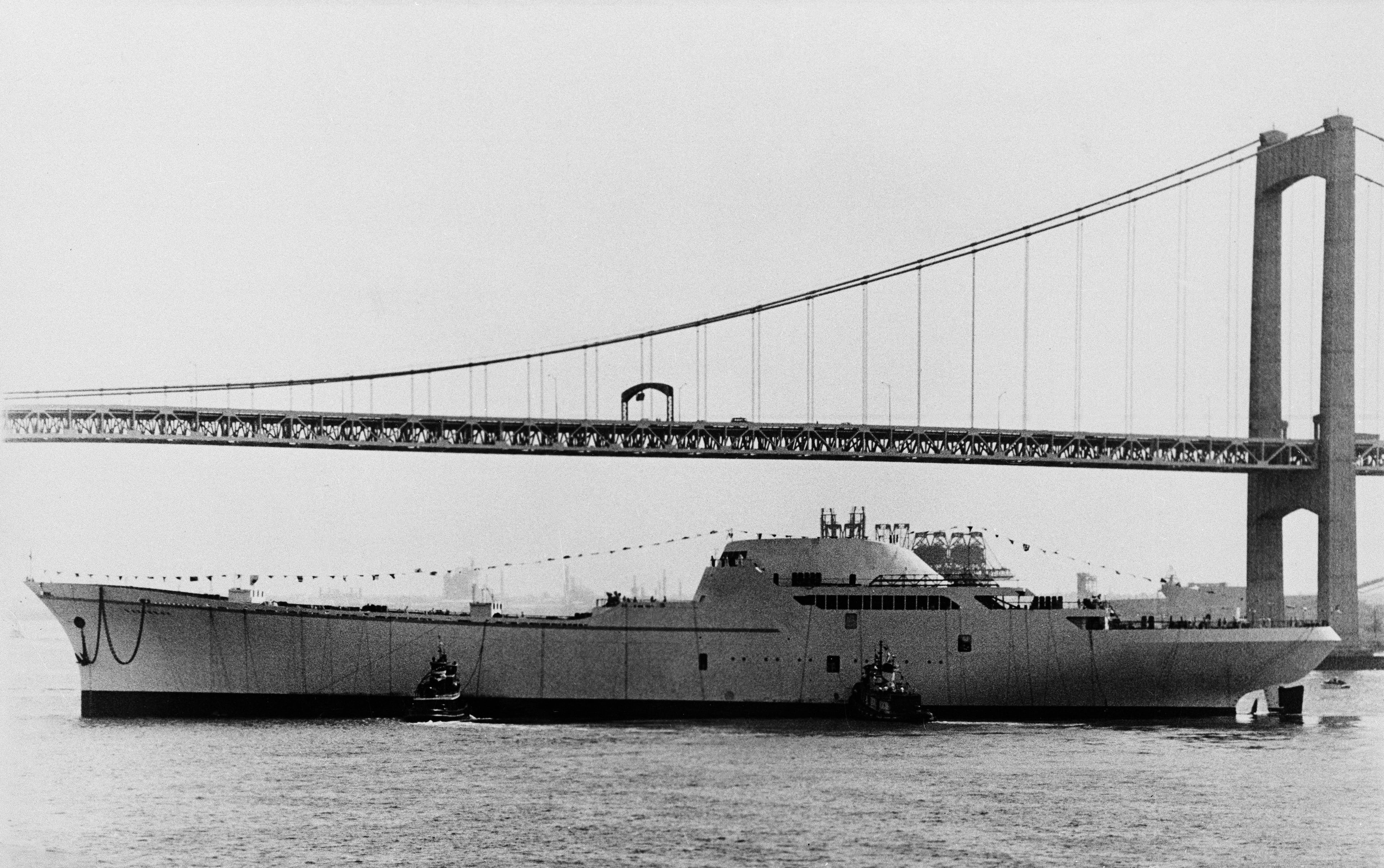 The first nuclear-powered merchant ship, the NS Savannah, passes the Walt Whitman Bridge near Camden, N.J., shortly after being christened on July 21, 1959. (Bill Achatz/AP 1959)