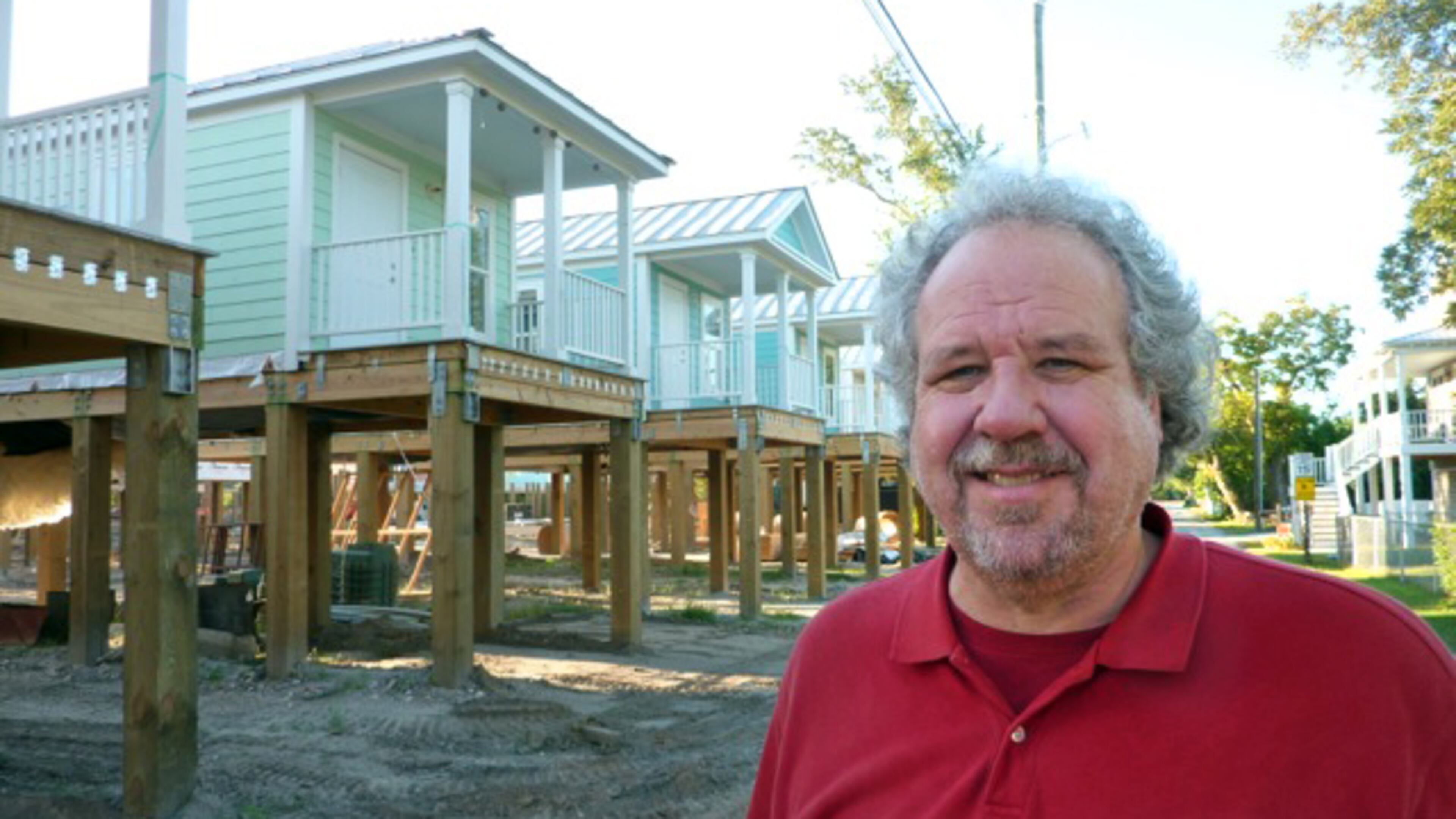 Architect Bruce Tolar with one of his cottage court communities, built in his home base of Ocean Springs, Mississippi. Tolar, a veteran of New Orleans’ post-Hurricane Katrina rebuilding, will design Decatur’s first cottage court project, with building scheduled to start next spring or early summer. Photo courtesy of placemakers.com website.