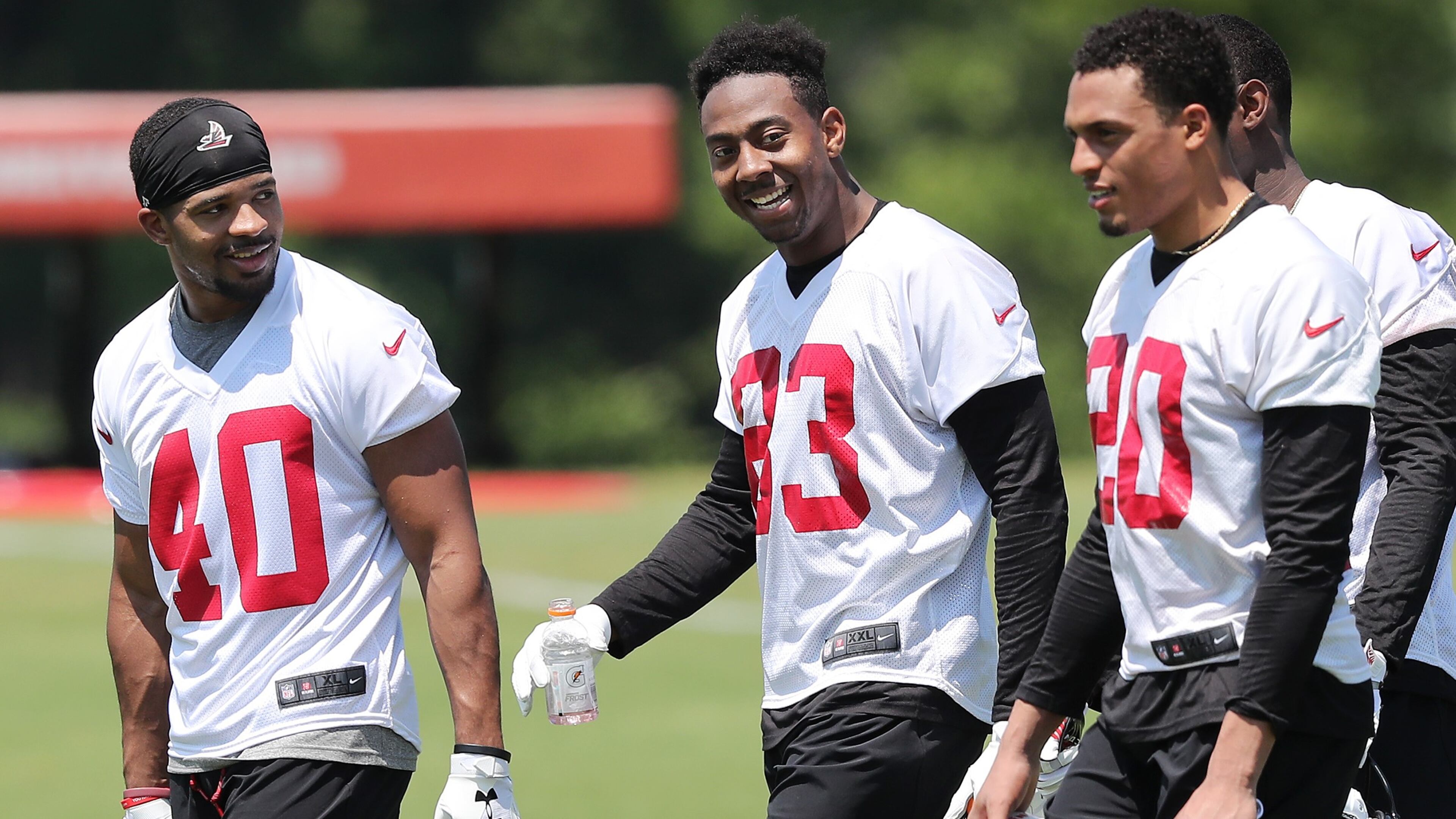 Atlanta Falcons safety Tere Calloway (from left), wide receiver Russell Gage, and cornerback Isaiah Oliver walk of the field at the end of the first day of rookie-mini-camp on Friday, May 11, 2018, in Flowery Branch. Curtis Compton/ccompton@ajc.com