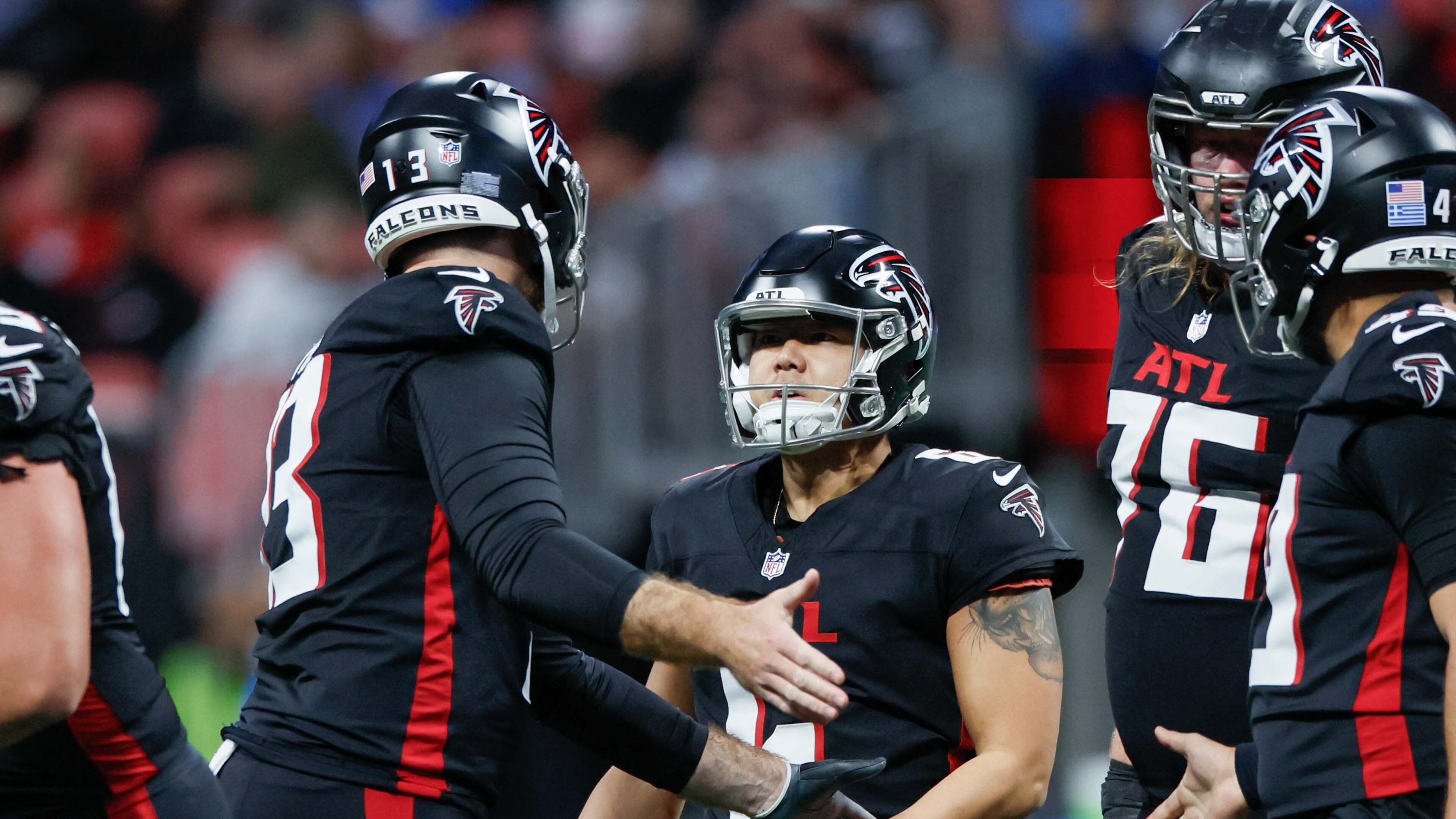 Atlanta Falcons punter Bradley Pinion (13) speaks with Atlanta Falcons place kicker Younghoe Koo (6) after missing a field goal during the first half of an NFL football game against the Los Angeles Chargers on Sunday, December 1, 2024, at Mercedes-Benz Stadium in Atlanta.
(Miguel Martinez/ AJC)