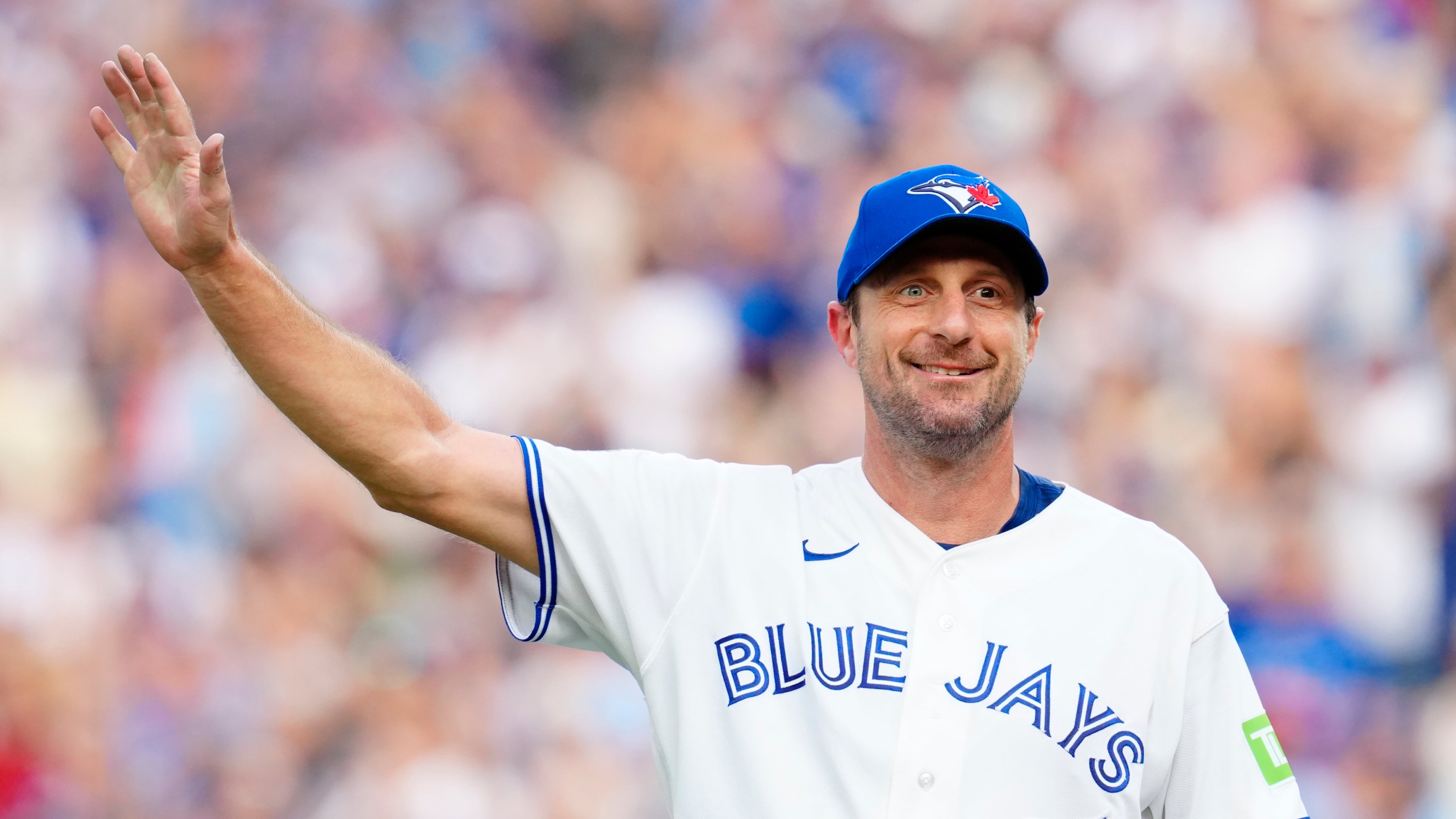 Toronto Blue Jays pitcher Max Scherzer (31) reacts to fans after he was pulled from the game against the Cincinnati Reds during eighth inning MLB baseball action in Toronto on Sunday, Sept. 27, 2026. (Frank Gunn/The Canadian Press via AP)