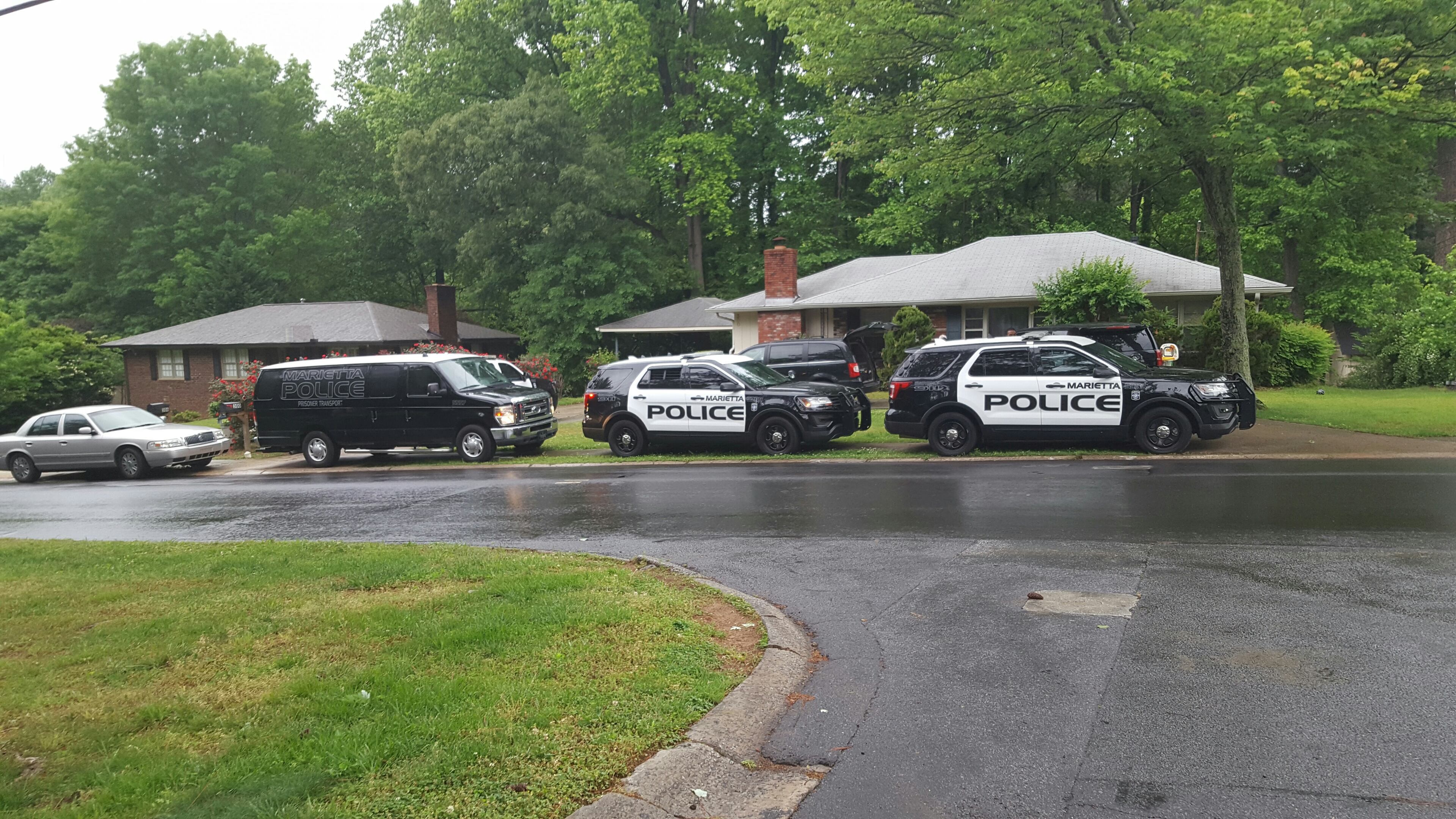 Marietta police executed a search warrant at 300 Kirkpatrick Road and arrested three alleged gang members. (Credit: Marietta Police Department)