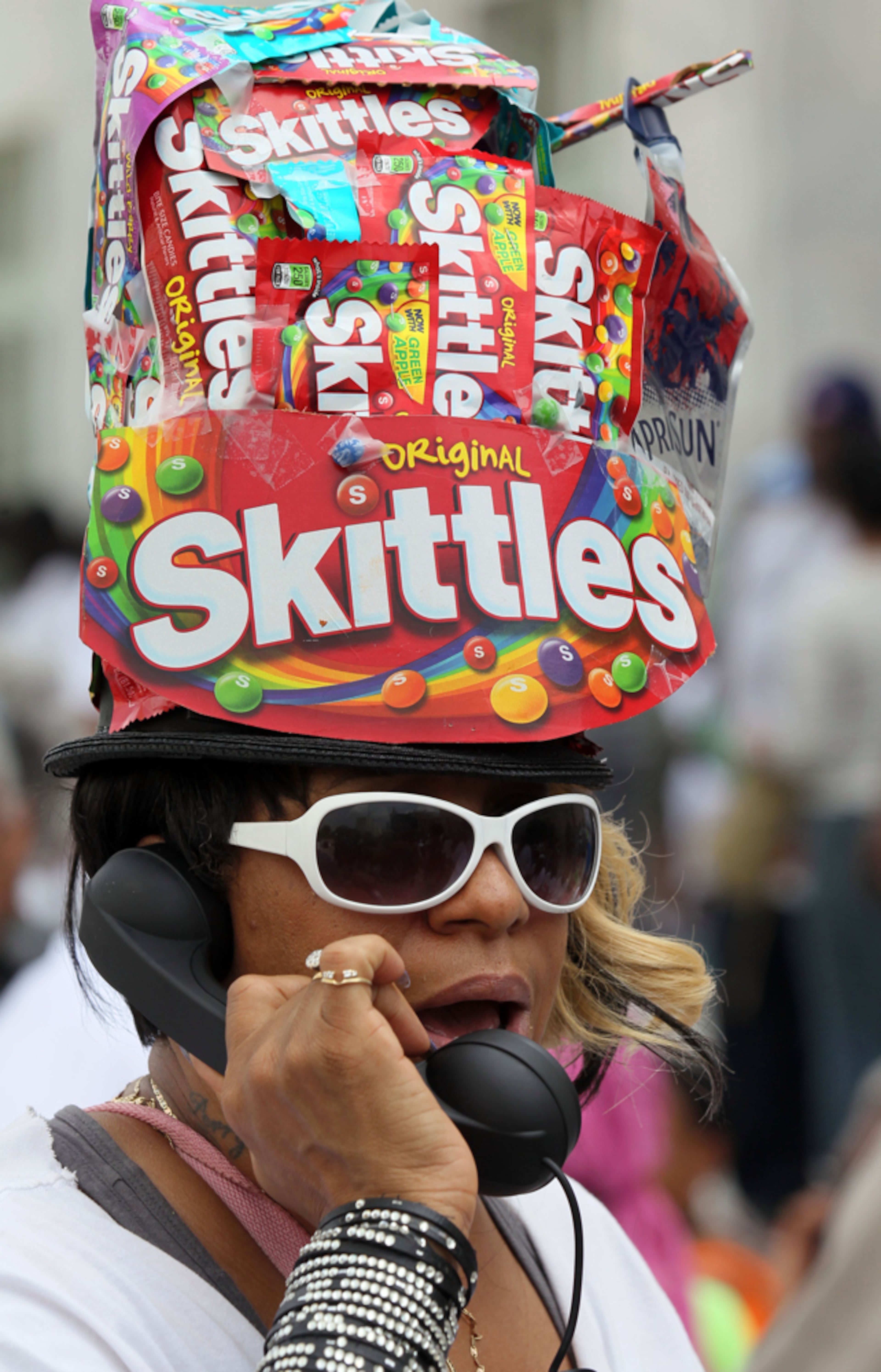 JULY 20, 2013-ATLANTA: A woman who would only identify herself as Gabriel wears a hat she made out of Skittles as thousands gathered to take part in a prayer vigil and rally in honor of Trayvlon Martin in front of the Richard Russell Federal Building on Saturday July 20th, 2013. Organizers said it was designed to bring healing in the wake of the George Zimmerman trial in the killing of Trayvon Martin and to call attention to what they see as problematic laws like Stand your Ground. The rally is one of 100 being planned for this Saturday in U.S. cities. Rev. Al Sharpton has called for these and local organizer Rev. Markel Hutchins said the rally will include people from all races and religions in the spirit of Dr. Martin Luther King. PHIL SKINNER / PSKINNER@AJC.COM