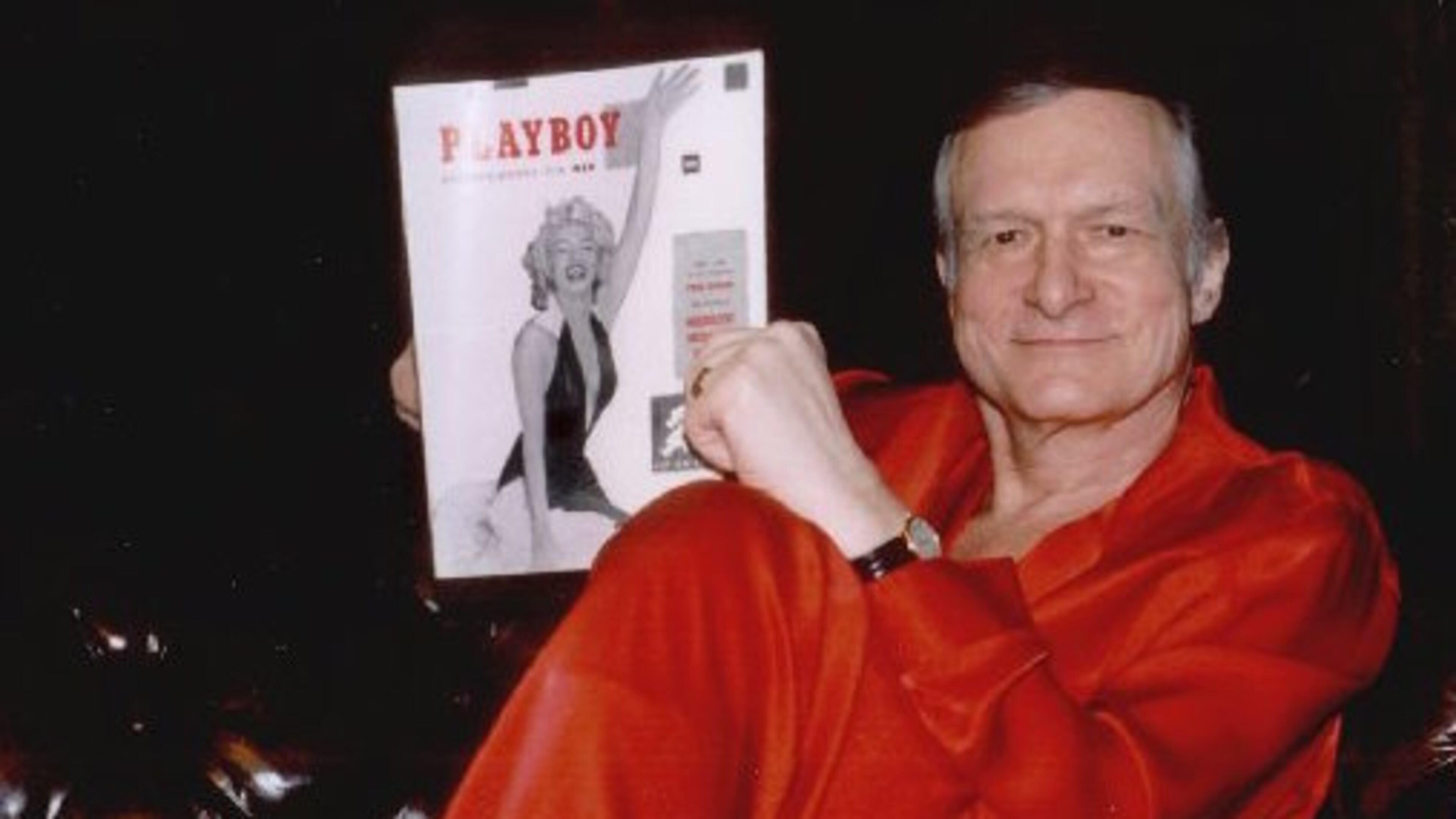 Hugh Hefner with the inaugural Playboy issue. Associated Press file photo
