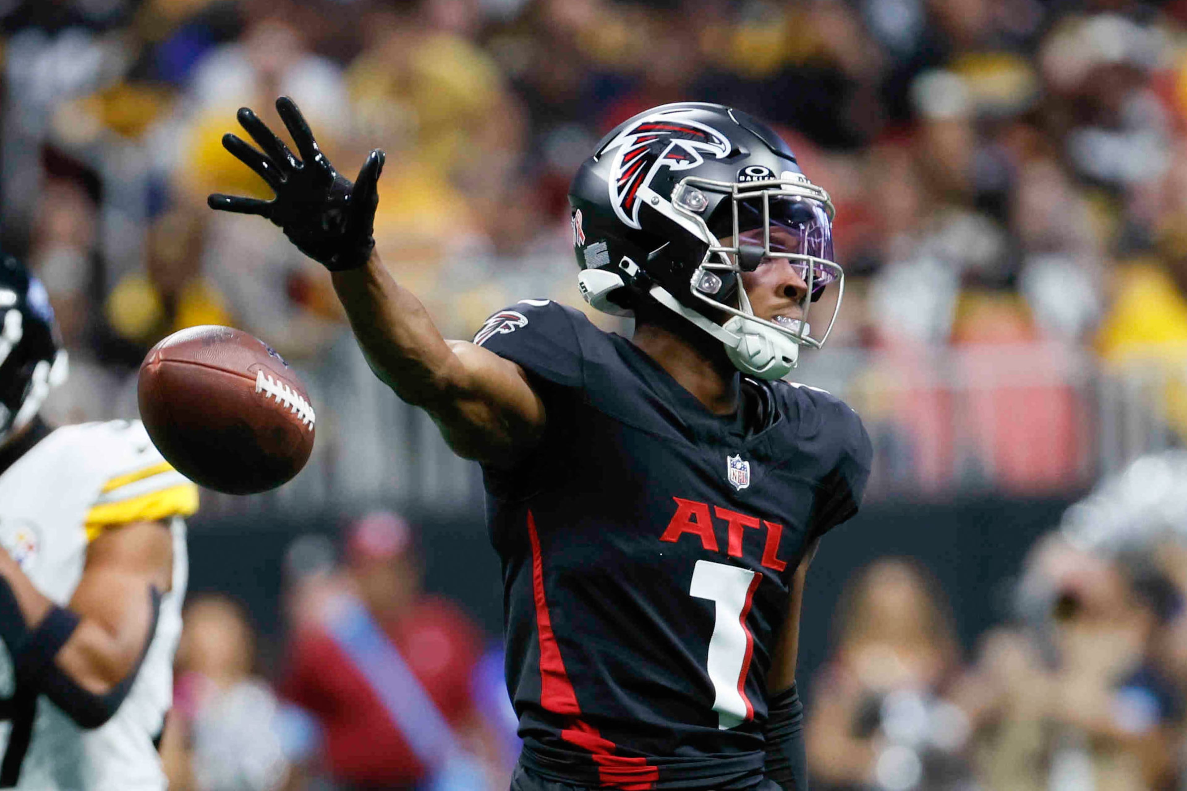 Falcons wide receiver Darnell Mooney reacts after a first down during the first half of an NFL football game against the Steelers on Sunday, Sept. 8, at Mercedes-Benz Stadium in Atlanta.
(Miguel Martinez/ AJC)