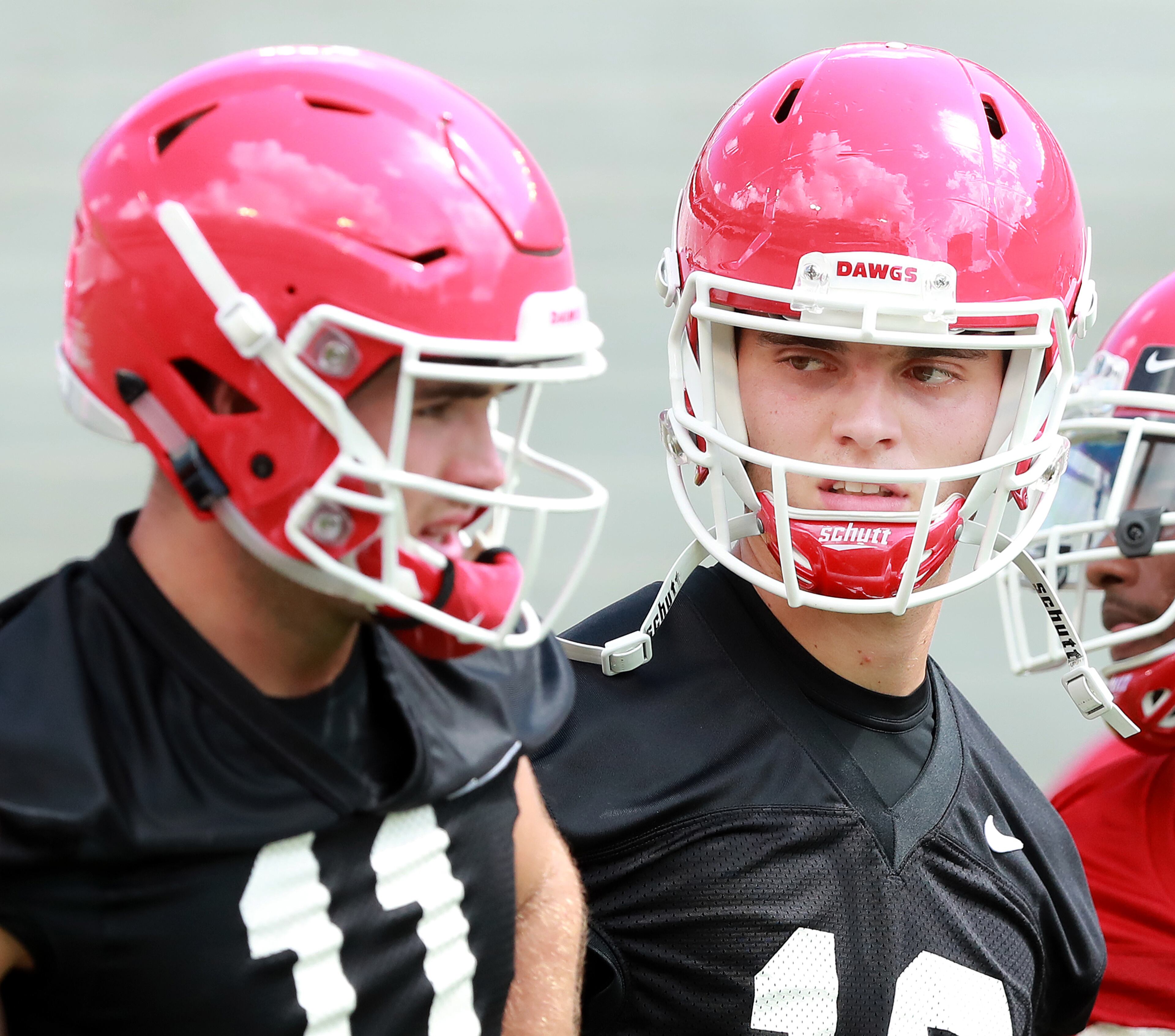 August 4, 2018 Athens: Georgia quarterback John Seter works with Jake Fromm during team practice at Fan Day on Saturday, August 4, 2018, in Athens. Curtis Compton/ccompton@ajc.com