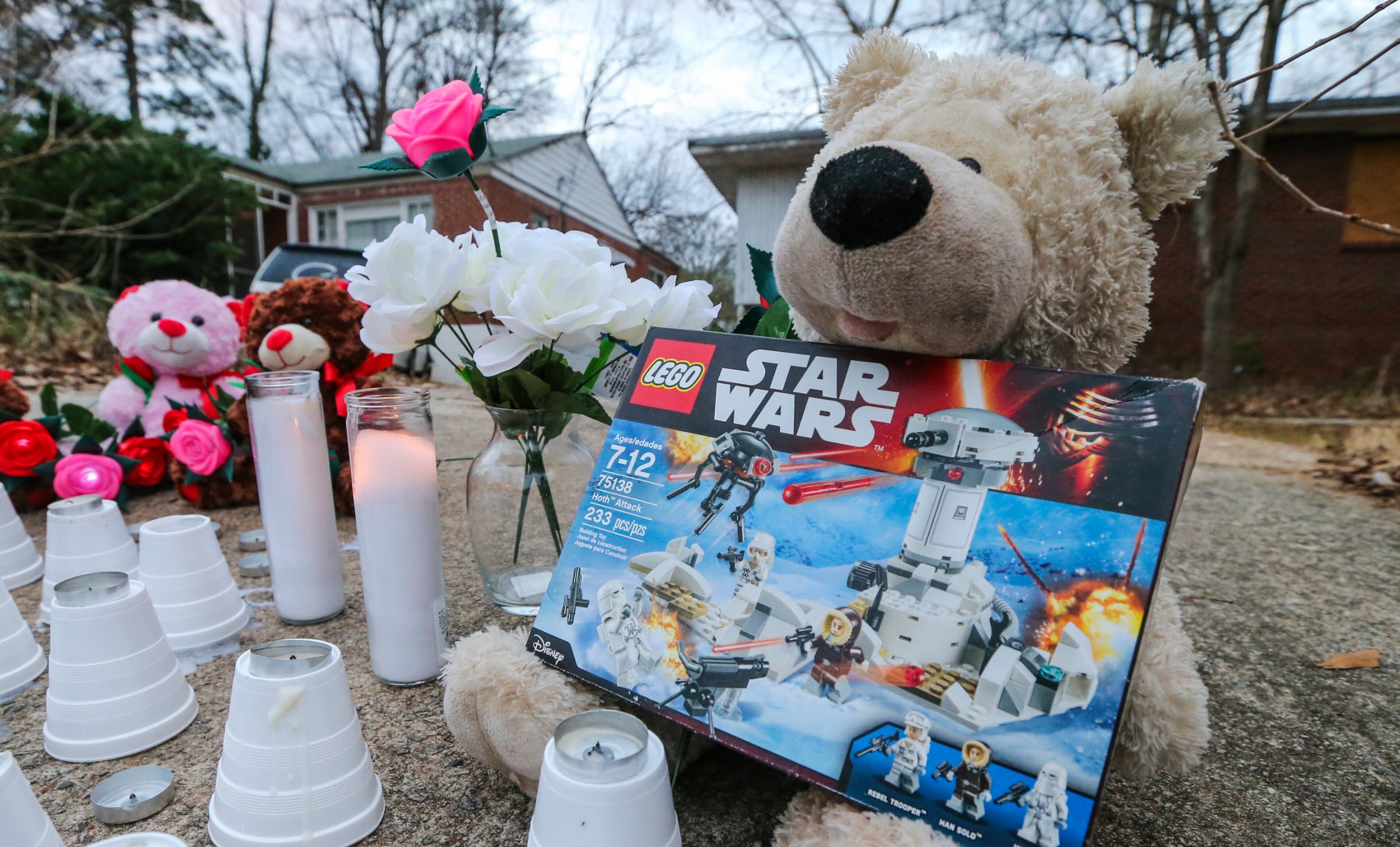 January 18, 2017 Atlanta: A memorial was placed overnight into Wednesday morning, Jan. 18, 20178 on Jasper Street near where a boy was killed and a girl was injured early Tuesday in aÊpit bull attack on their way to school, Atlanta policeÊsaid. Logan Braatz and Syari Sanders, students at F.L. Stanton Elementary School, were walking to a bus stop in the 1200 block of Gideons Drive in southwest Atlanta when they were mauled, police and school officials said. While the Fulton County Medical ExaminerÕs office has not officially identified the children, relatives of the victims released names and photos to Channel 2 Action News. They were taken to ChildrenÕs Healthcare of Atlanta at Egleston with serious injuries. Logan, 6, wasÊlater taken to Grady Memorial HospitalÕs trauma unit, where he died.ÊSyariÊwas still at Egleston in stable condition, Atlanta Public Schools spokeswoman Kimberly Willis Green said. SyariÕs family told Channel 2 she is alert and conscious.ÊÒWeÕre still trying to evaluate to figure out what really happened,Ó Atlanta police Sgt. Warren Pickard said. Police are certain two dogs were involved in the deadly attack. The dogsÕ owner, Cameron Tucker, was arrested on two misdemeanor counts of reckless conduct, Pickard said.