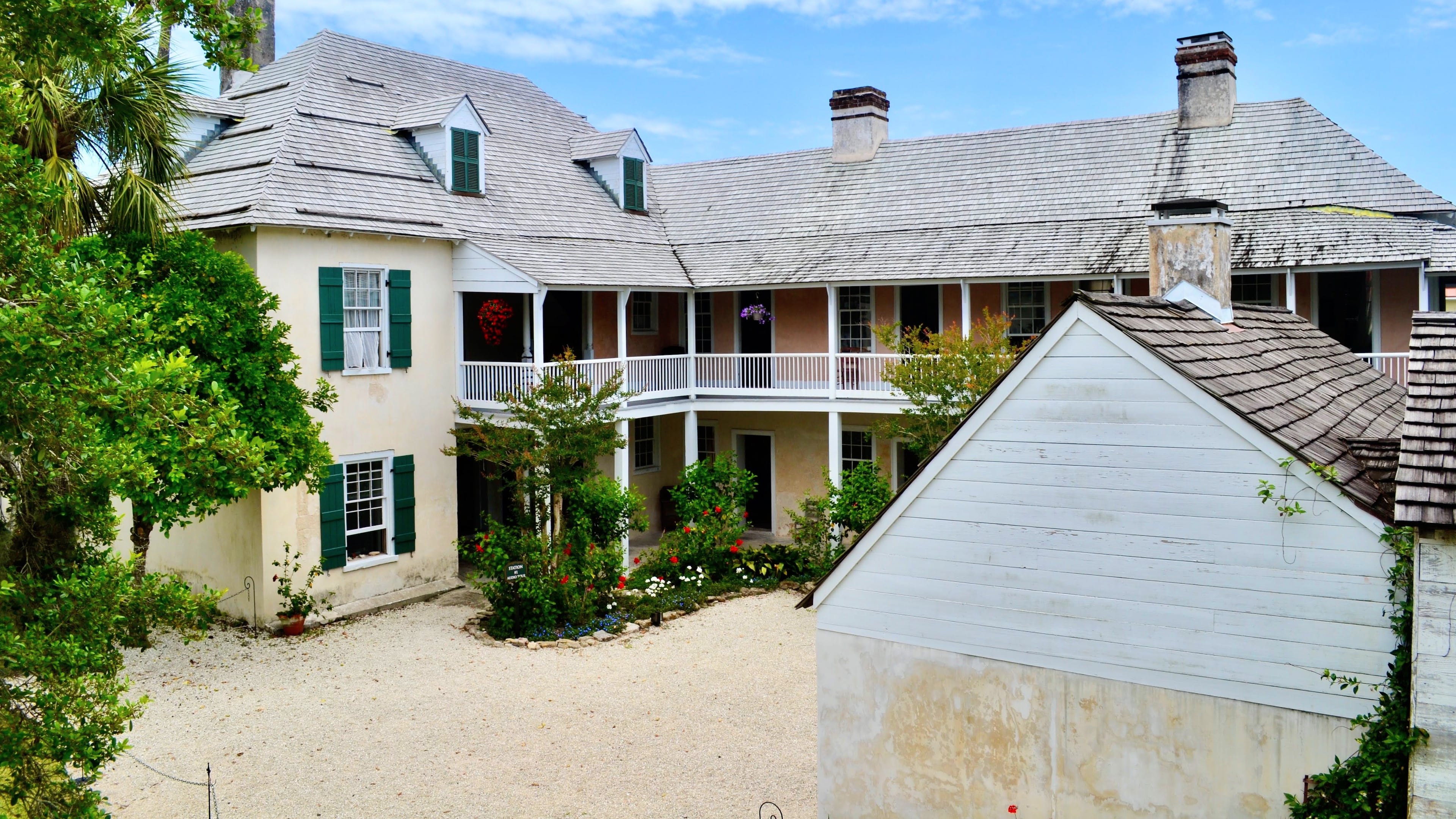 A courtyard is tucked into the center of the historic Ximenez-Fatio House. The L-shaped coquina home was built in 1798. (Courtesy of the Ximenez-Fatio House Museum/NSCDA Florida)