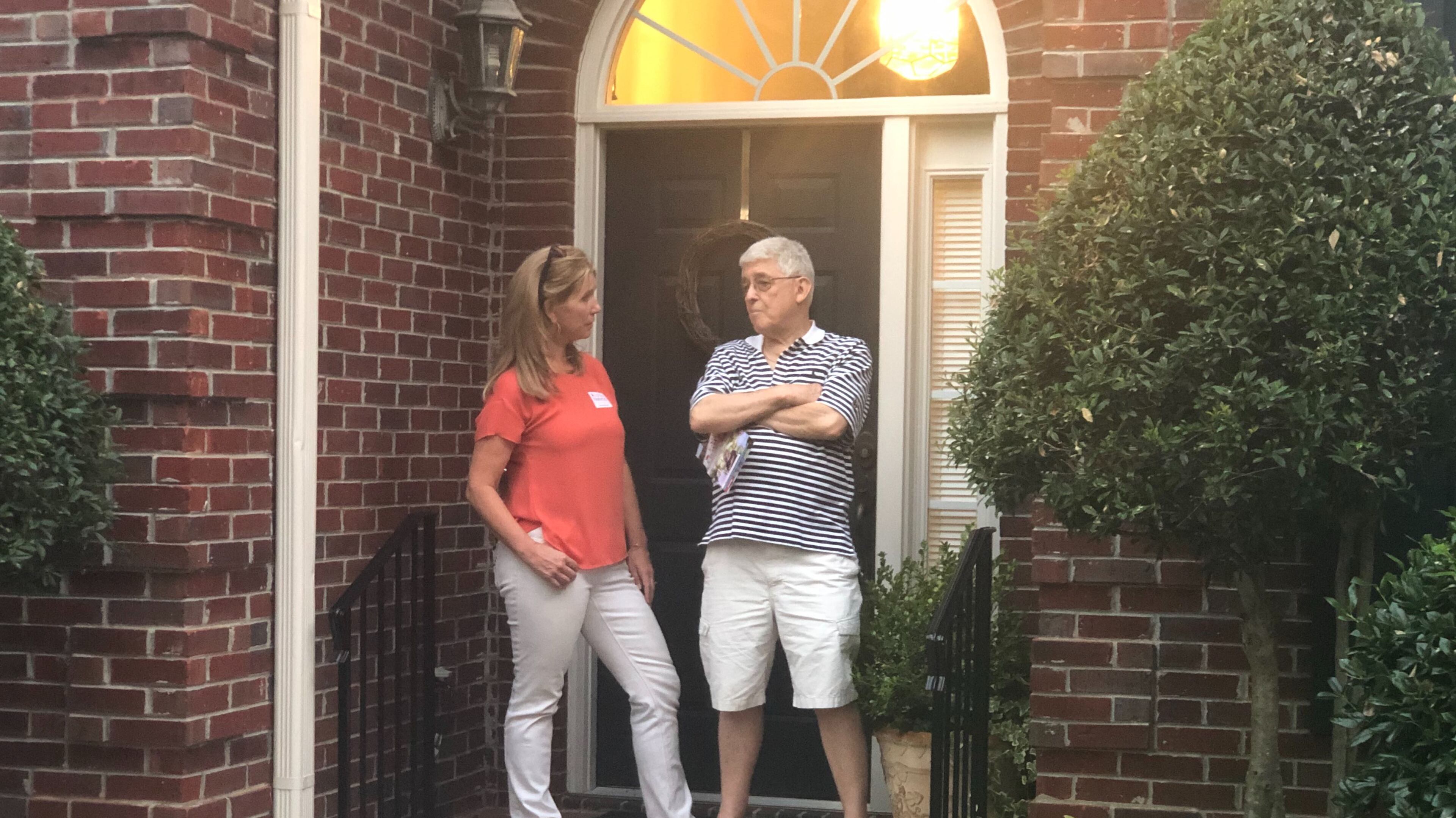 Lynne Homrich, a Republican running in the 7th Congressional District, talks to Bill Schilleci at his home in Forsyth County. Homrich, like other Republicans running in the district, has positioned herself as a supporter of President Donald Trump and an opponent to efforts to impeach him. That was something Schilleci wanted to hear. “It’s chaos,” he said. “This impeachment thing started before Donald Trump put his hand on the Bible.” Impeachment is also an issue Democrats are running on in Georgia to varying degrees.