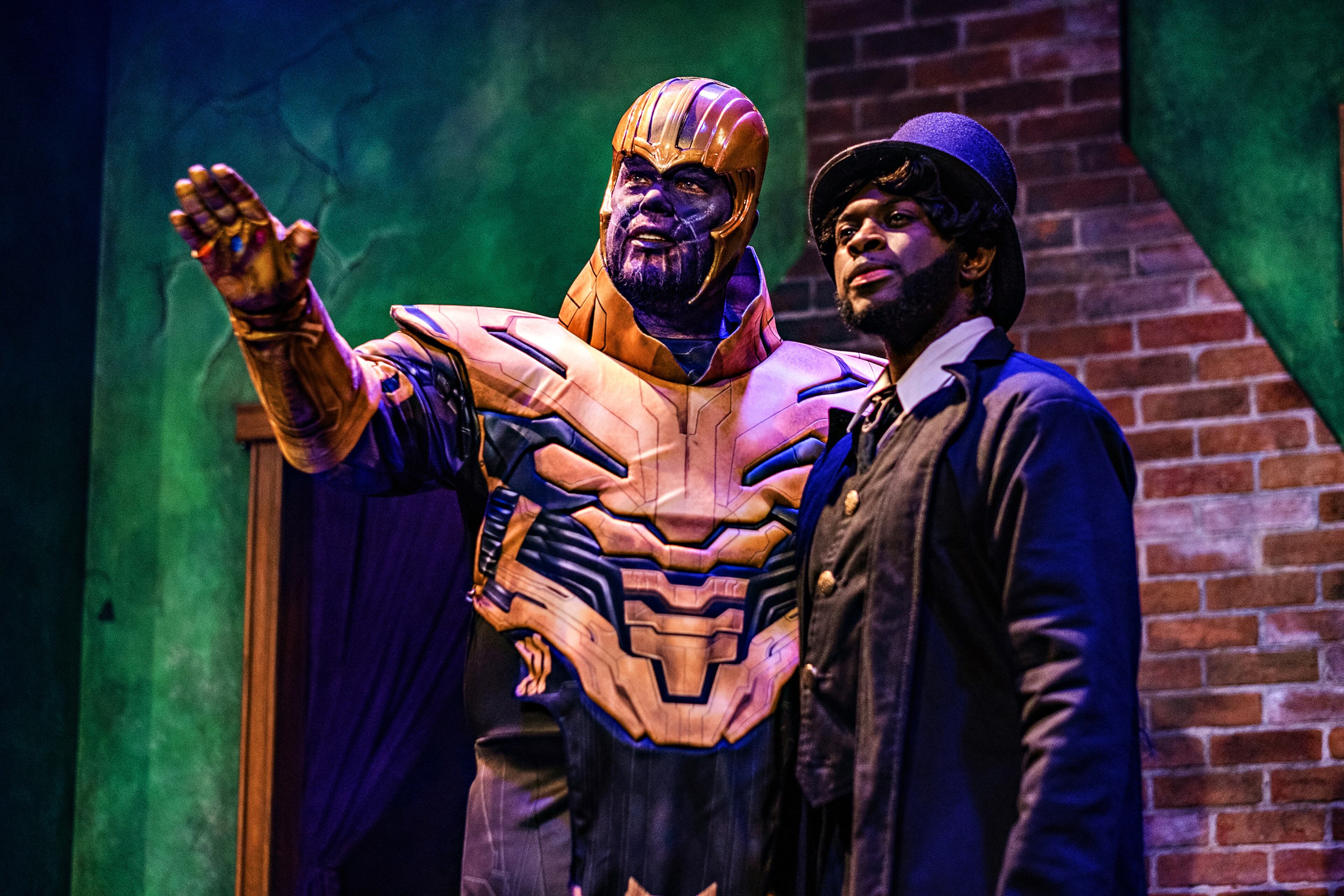 "Invasion: Christmas Carol" is the cheeky version of the Dickens classic presented every holiday season by Dad's Garage Theatre. In this alternate universe, a strange character (unknown to the players) enters the action and the rest of the cast must improvise around the invader. Here, Thanos, the destroyer from the Marvel Universe of "The Avengers," encounters Scrooge. Photo: Chelsea Patricia