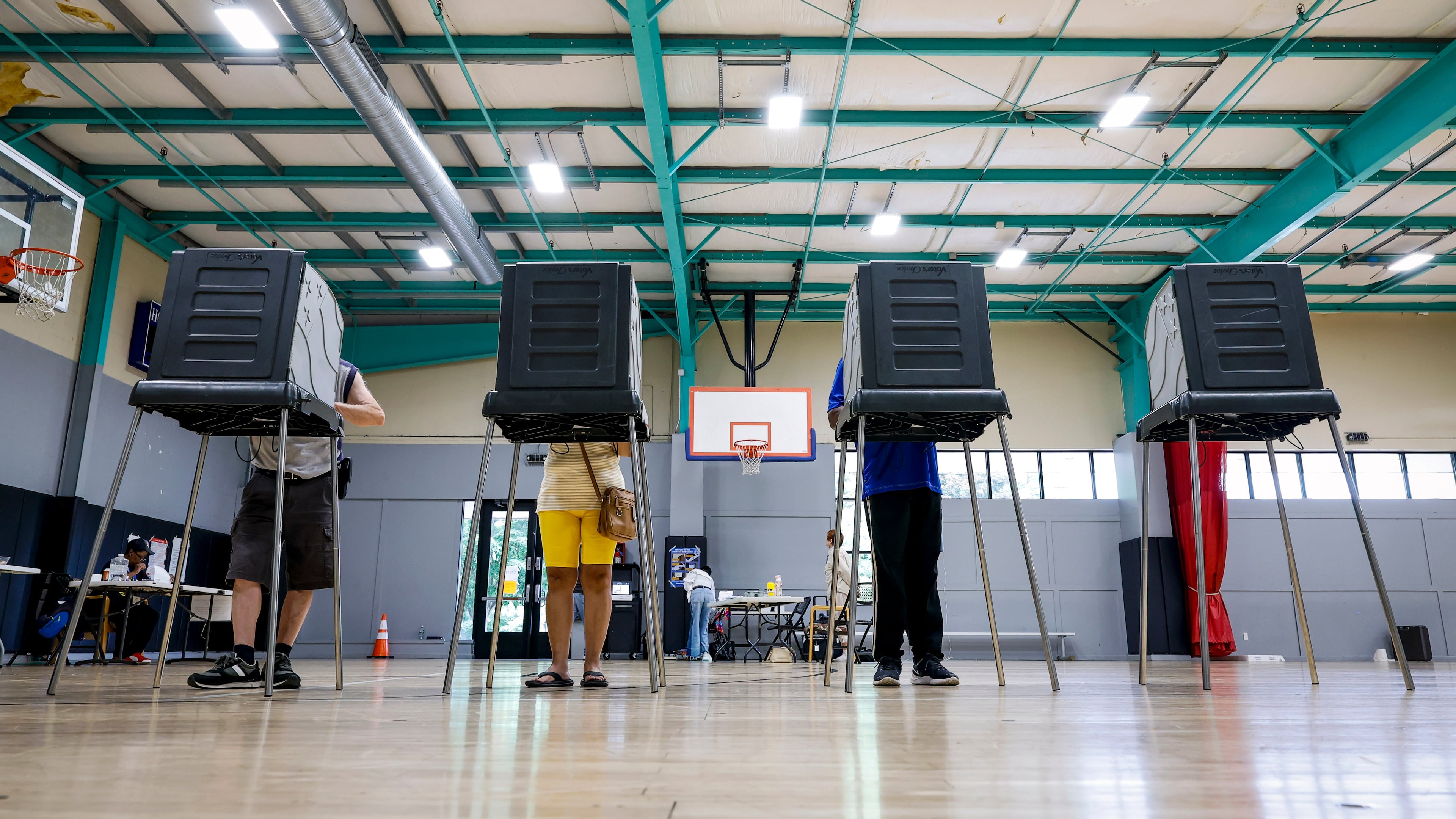 FILE - Voters cast their ballots during the primary election in Windsor, Conn., Aug. 11, 2026. (AP Photo/Rusty Jones, File)