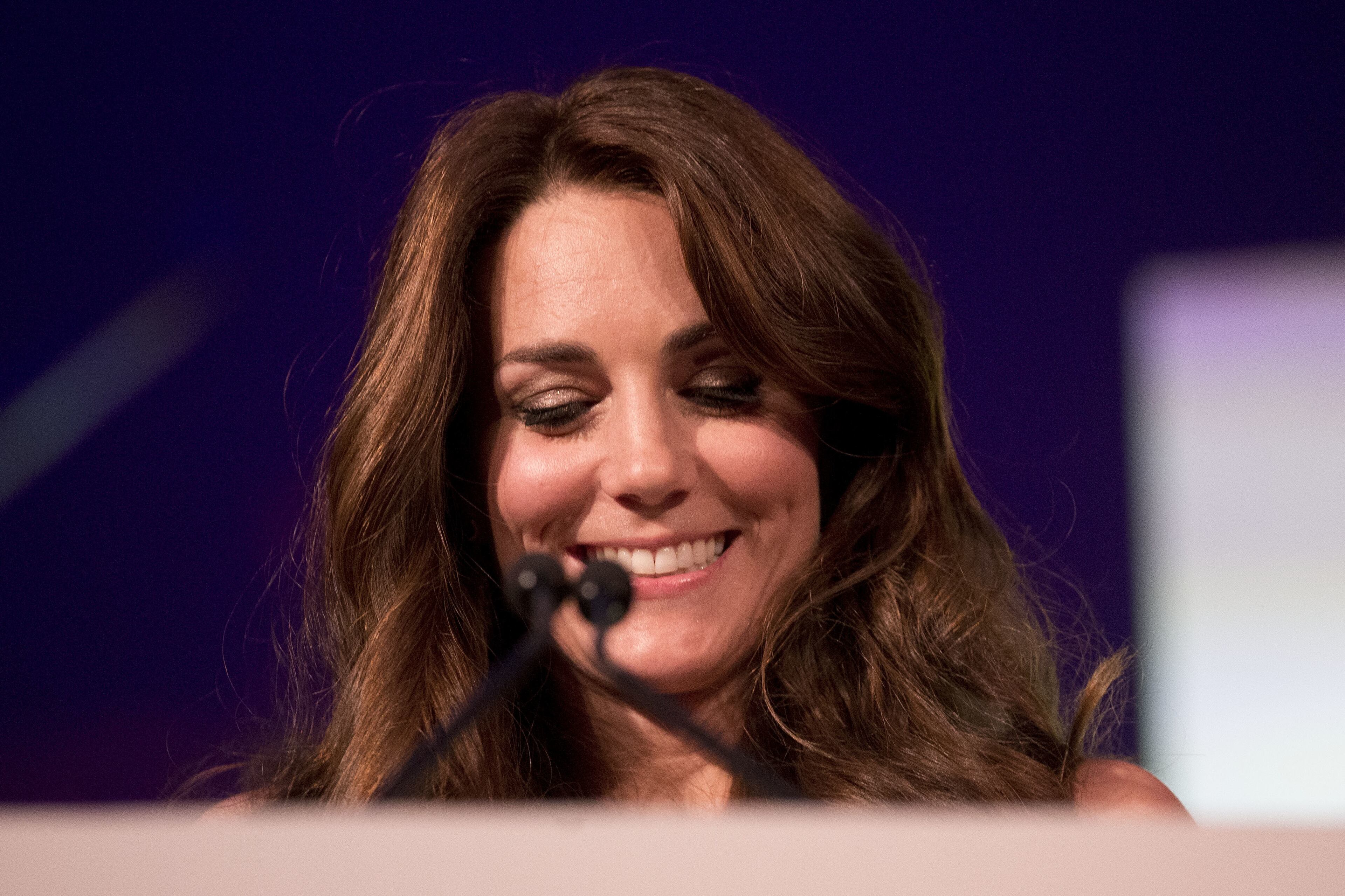 Catherine, Duchess of Cambridge prepares to open the envelope to announce the Victoria and Albert Museum as the winner of the Art Fund Museum of the Year 2016 prize at the Natural History Museum on July 6, 2016 in London, United Kingdom. The Art Fund Museum of the Year prize is awarded annually to one outstanding museum which has shown exceptional imagination, innovation and achievement in the preceding year. (Photo by Matt Dunham - Pool/Getty Images)