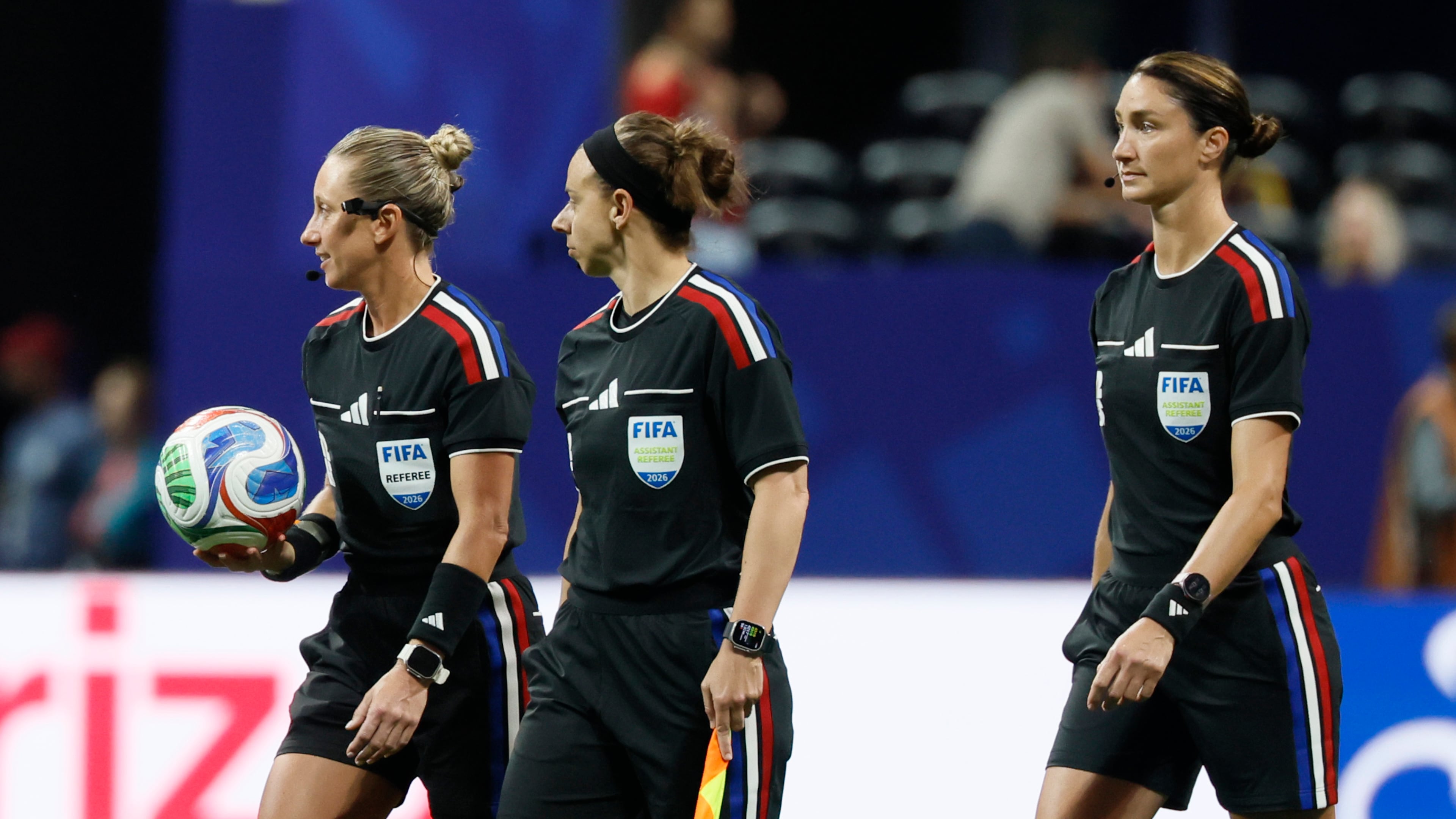 Head referee Tori Penso (left) is the first U.S. woman to be head ref at a World Cup match. She is joined by assistant referee Brooke Mayo (center) and Kathryn Nesbitt before the start of the Czechia vs. South Africa Group A FIFA World Cup match at Atlanta Stadium (Mercedes-Benz Stadium) on Thursday, June 18, 2026. (Miguel Martinez/AJC)