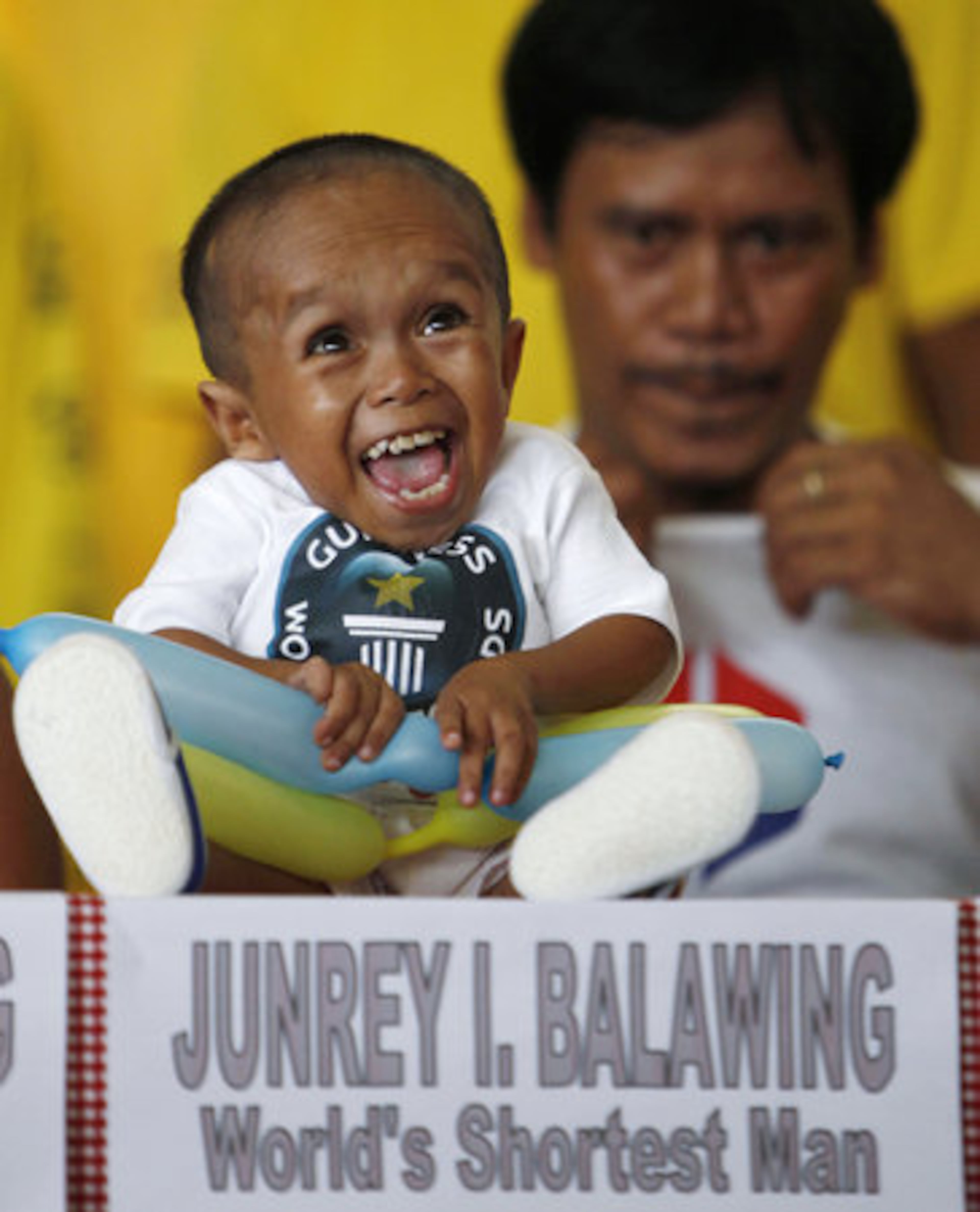 Junrey Balawing reacts after he was officially declared "the world's shortest living man" by the Guinness World Records at Sindangan Municipal Hall in Sindangan township, Zamboanga Del Norte province in Southern Philippines, Sunday June 12, 2011, on his 18th birthday.