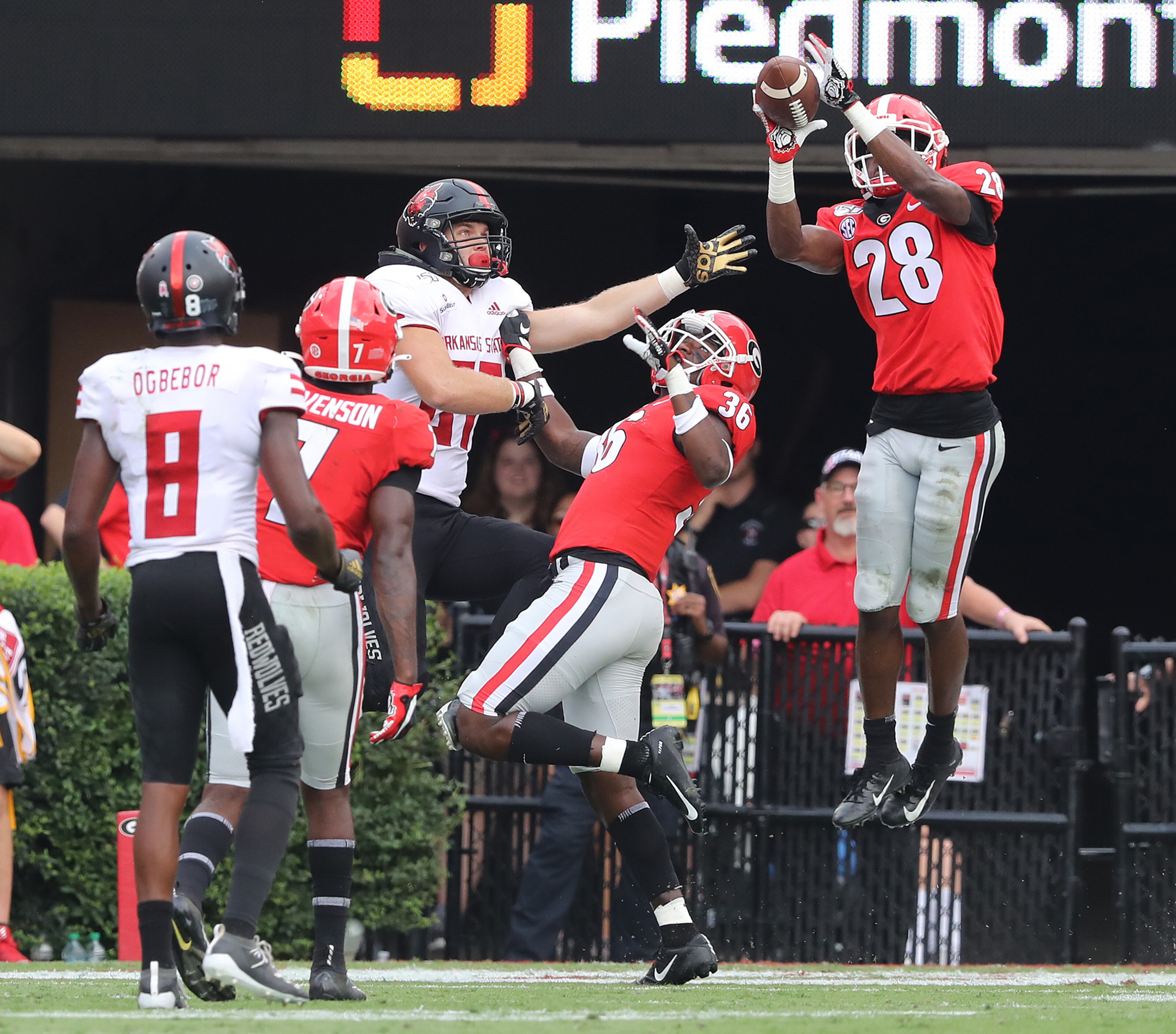 Georgia defensive back Christopher Smith intercepts Arkansas State in the end zone on fourth down. Curtis Compton/ccompton@ajc.com