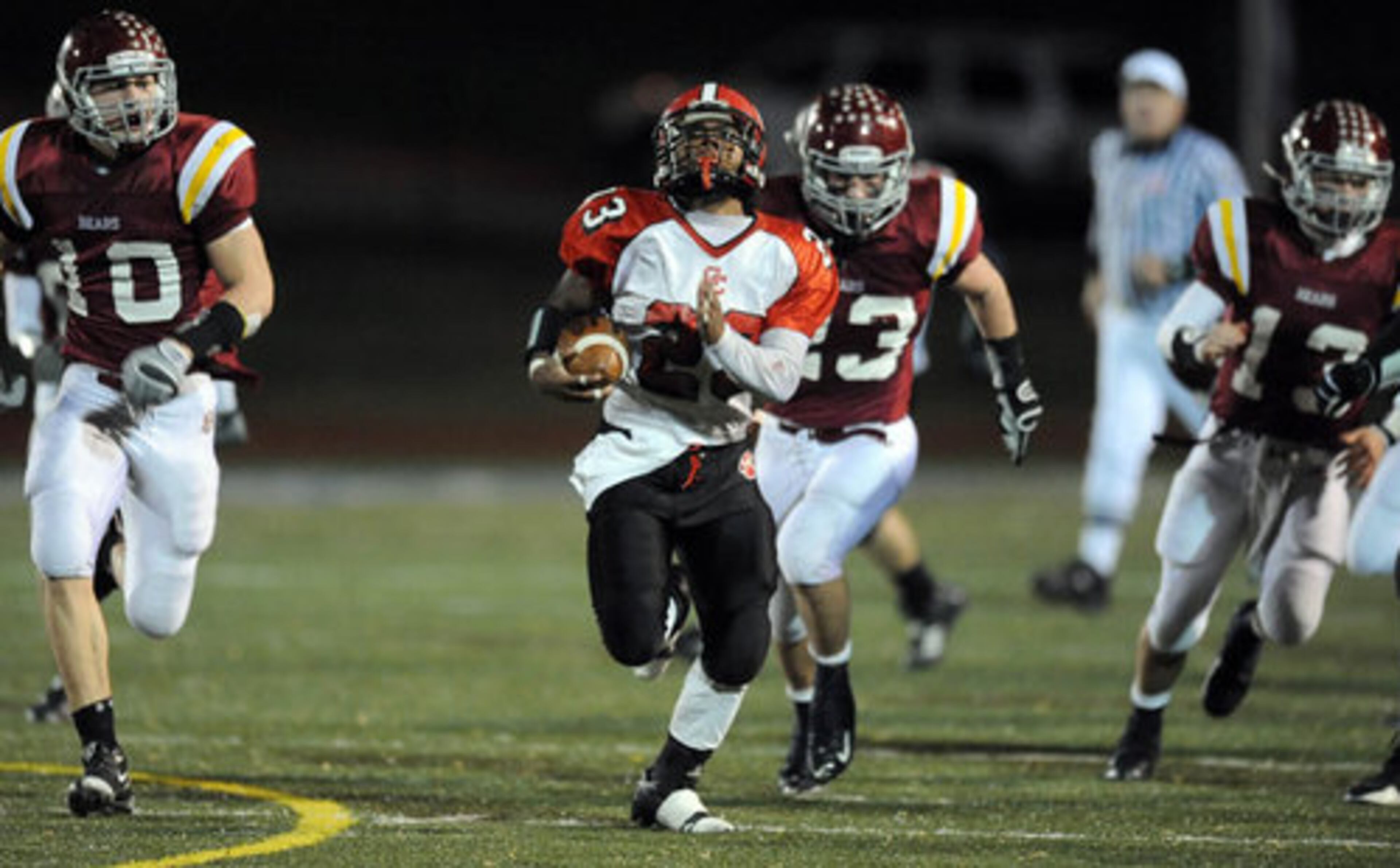 Clinch County's Trey Dorsey leaves a pack of defenders trailing behind as he runs for a score.